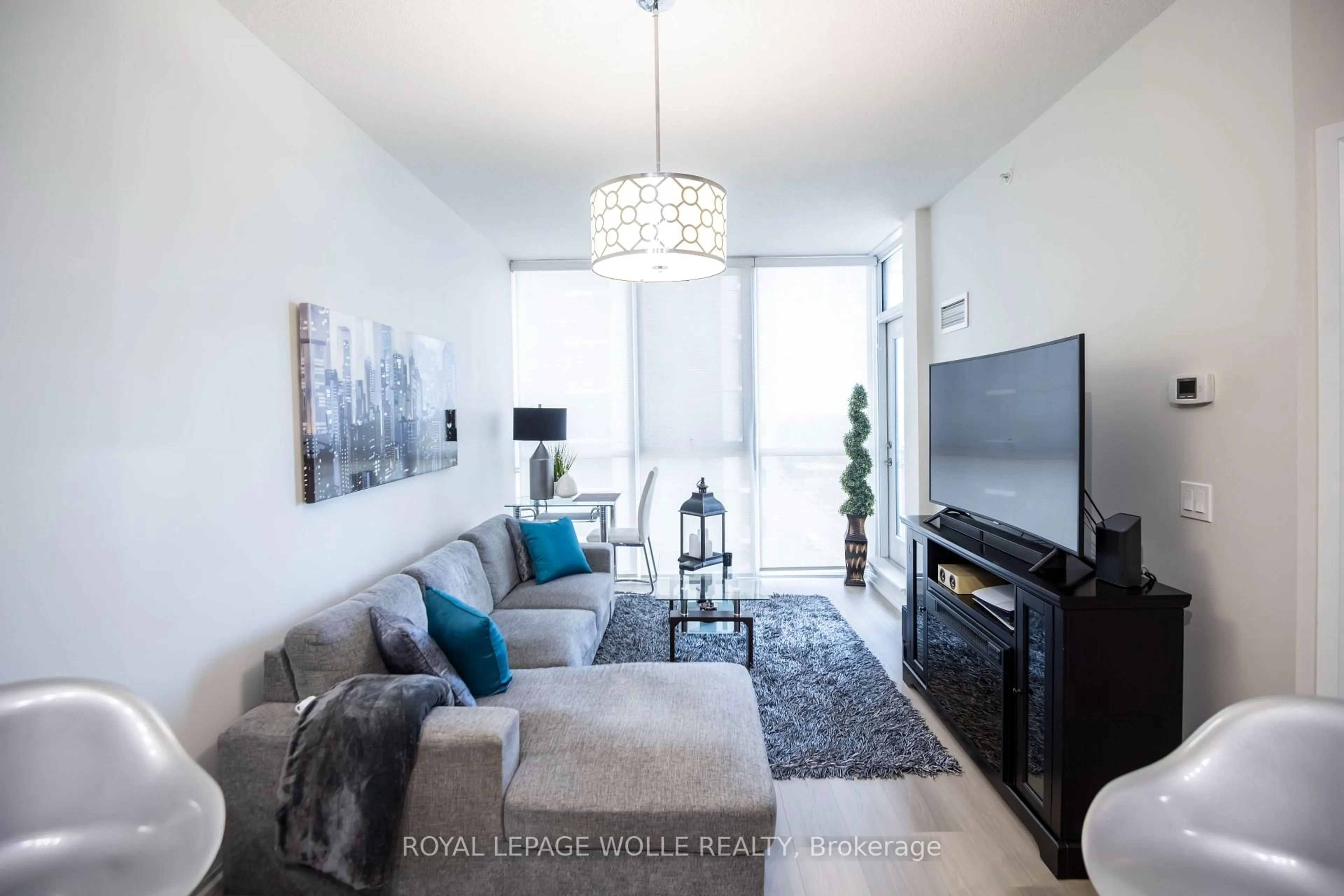 Living room with furniture, unknown for 75 Eglinton Ave #1601, Mississauga Ontario L5R 0E5