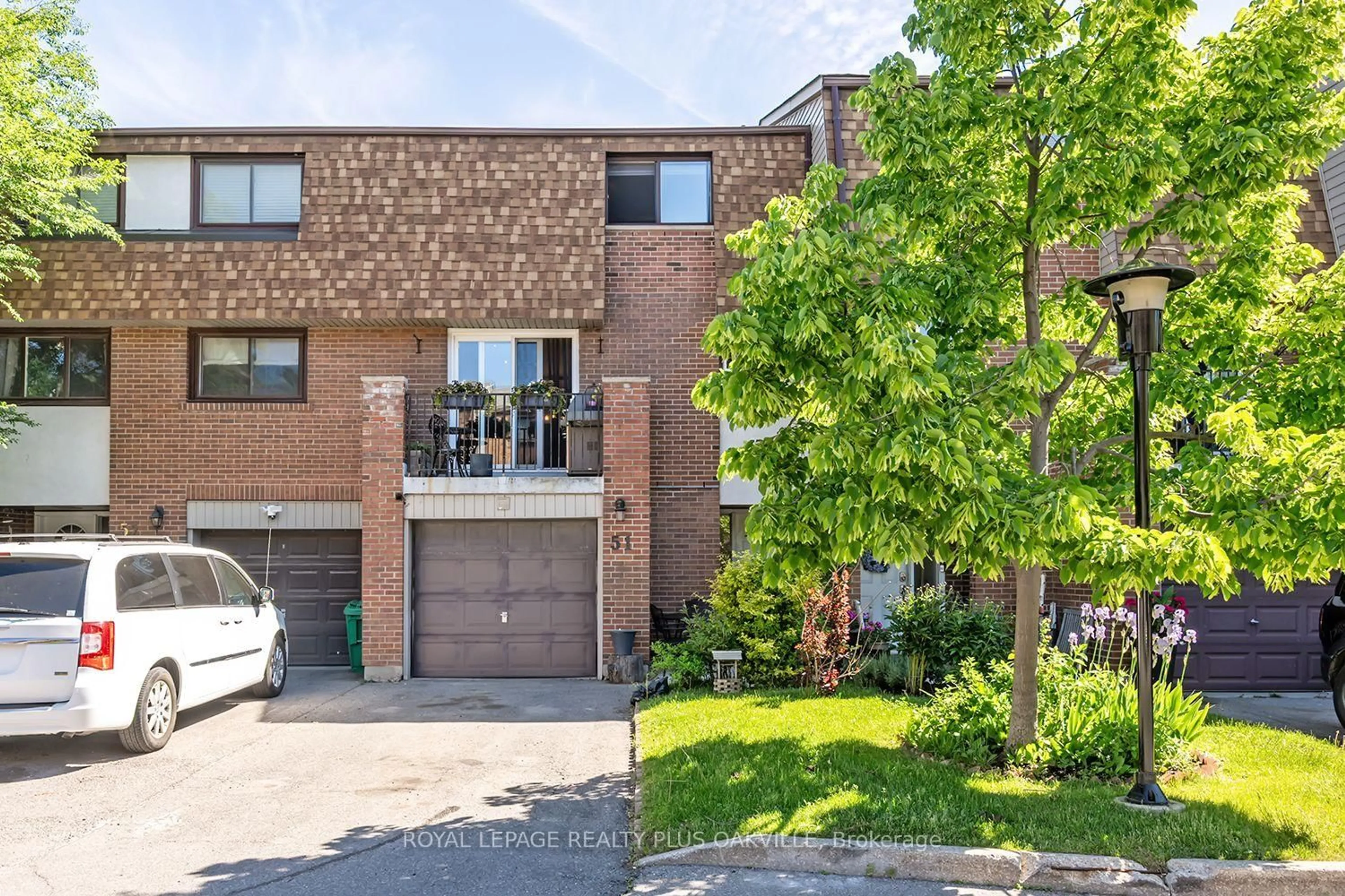 Home with brick exterior material, street for 1051 Cedarglen Gate #51, Mississauga Ontario L5C 3A7