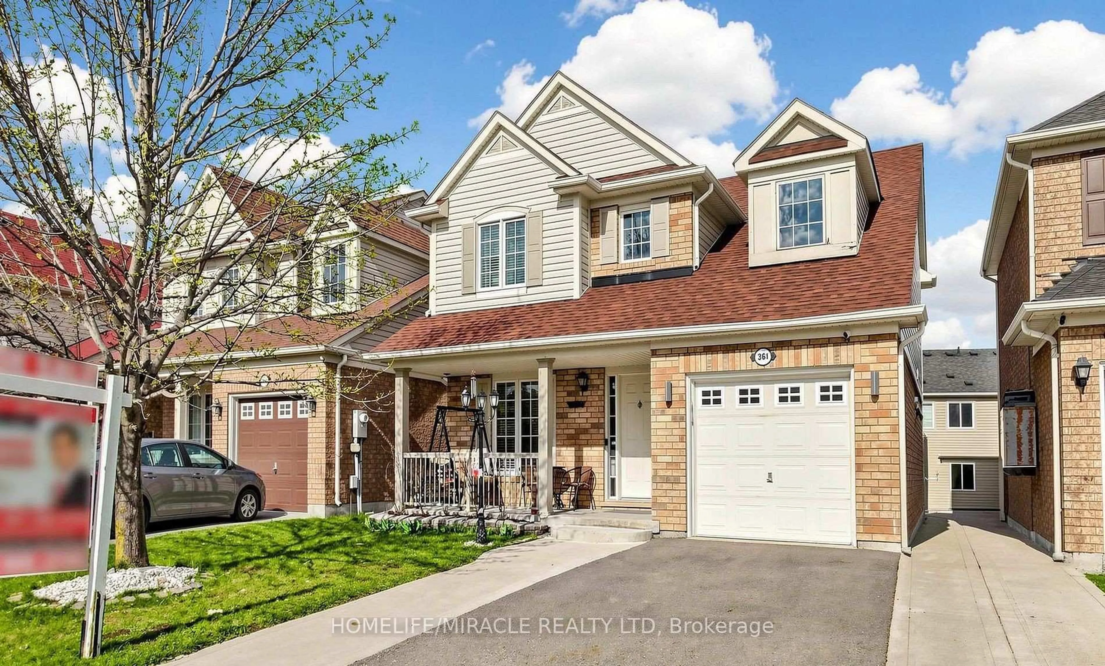 Home with brick exterior material, street for 361 Brisdale Dr, Brampton Ontario L7A 3M6