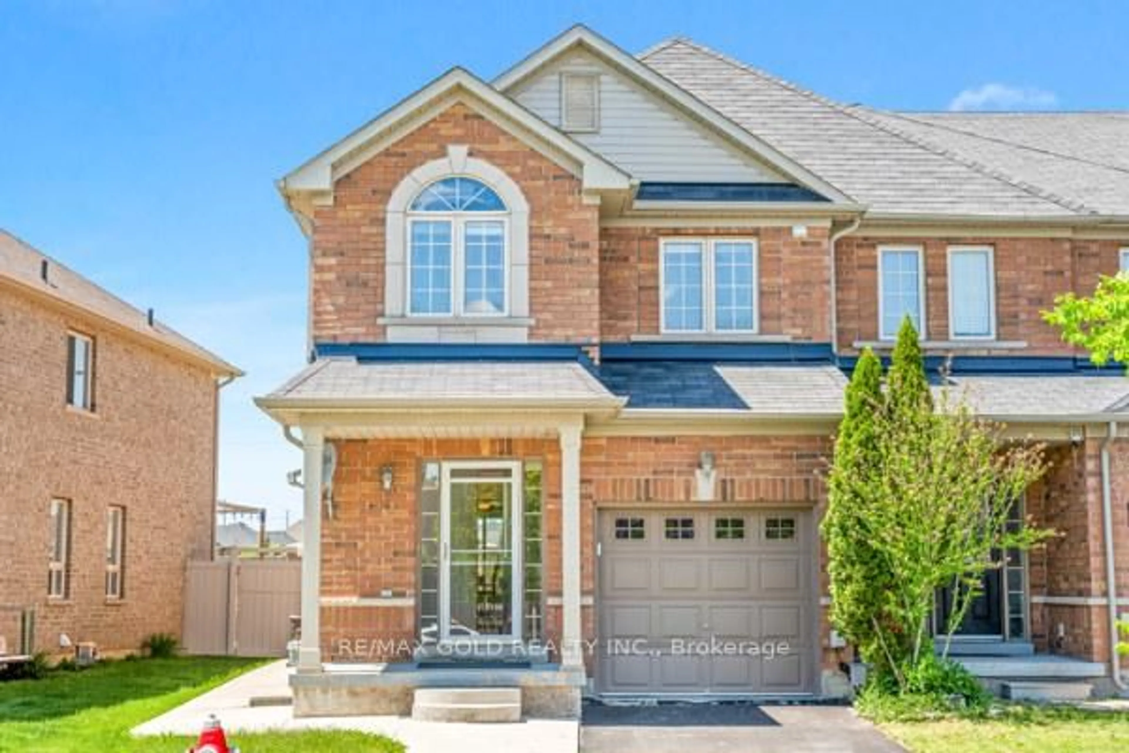 Home with brick exterior material, street for 100 Tomabrook Cres, Brampton Ontario L6R 0V5