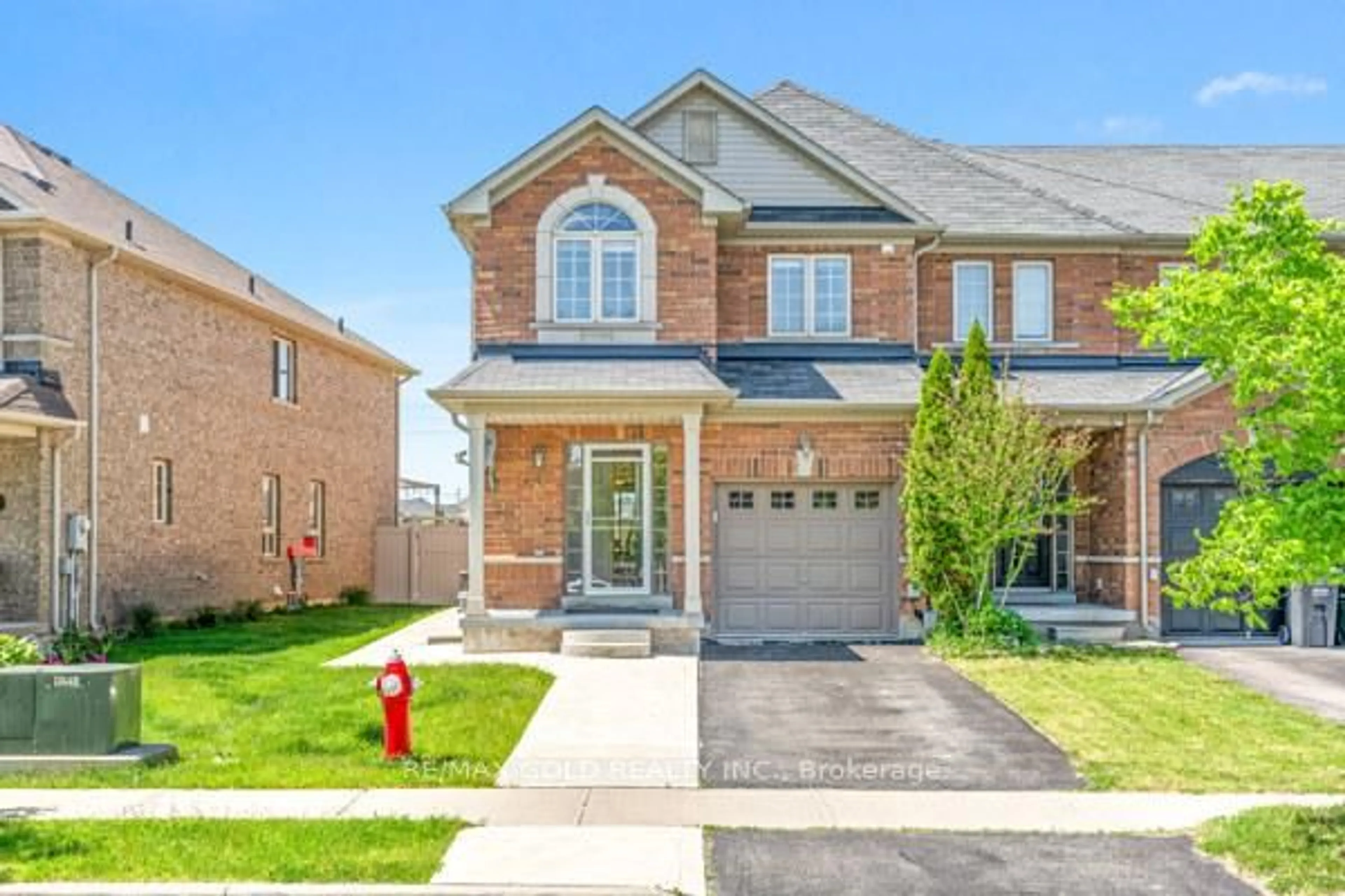 Home with brick exterior material, street for 100 Tomabrook Cres, Brampton Ontario L6R 0V5