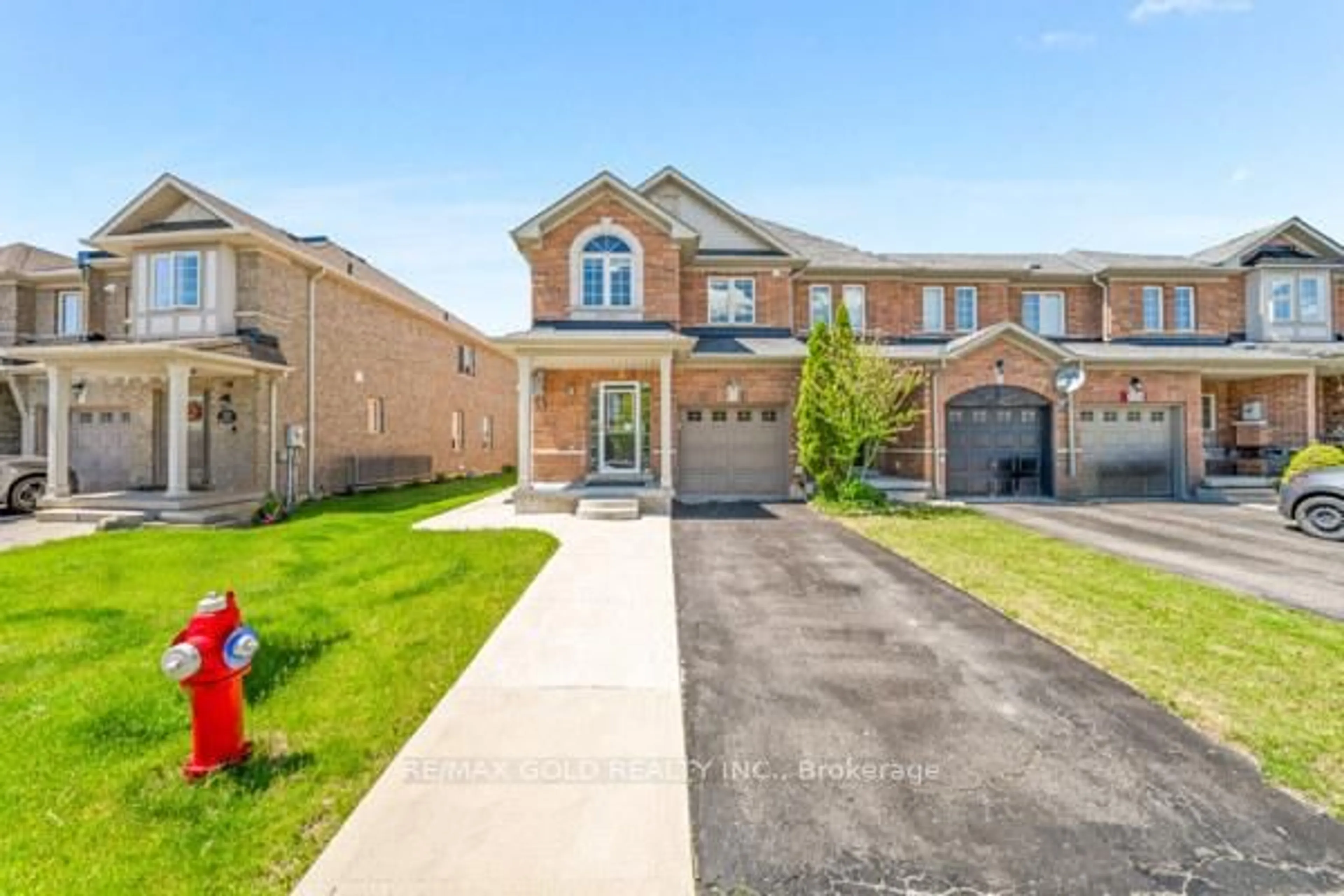 Home with brick exterior material, street for 100 Tomabrook Cres, Brampton Ontario L6R 0V5