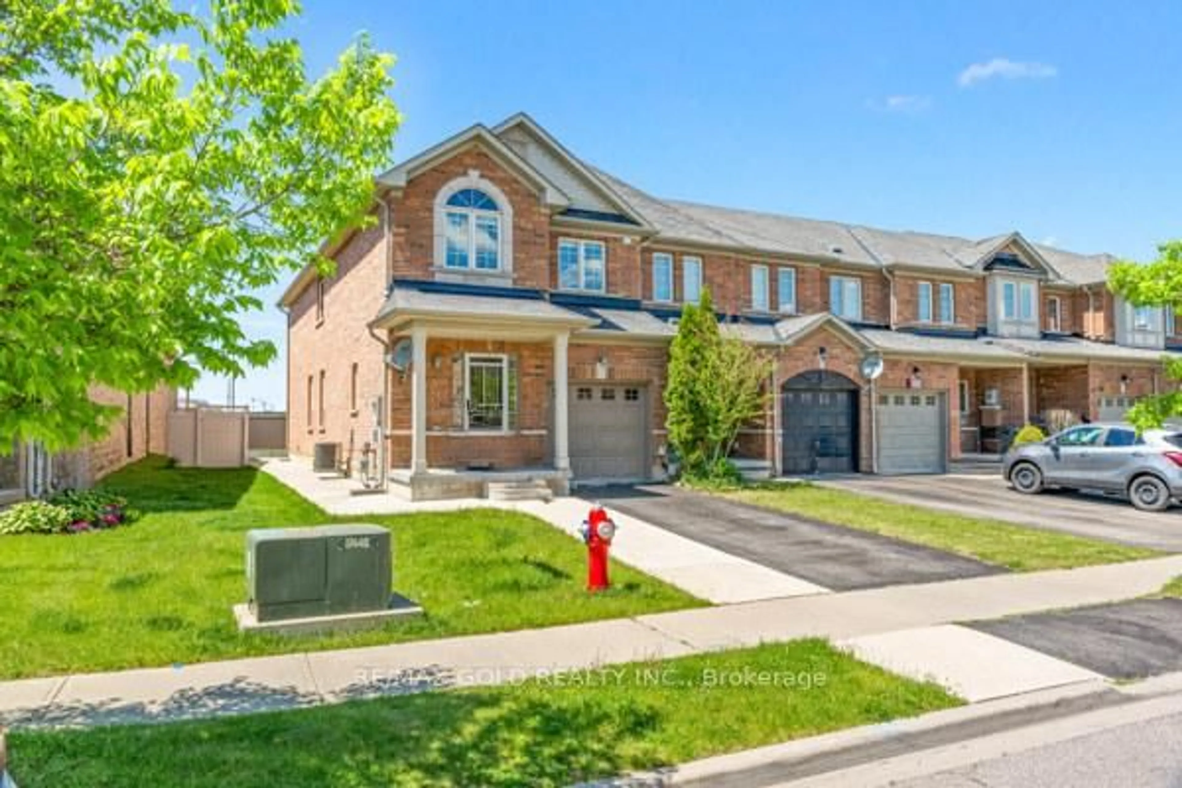 Home with brick exterior material, street for 100 Tomabrook Cres, Brampton Ontario L6R 0V5