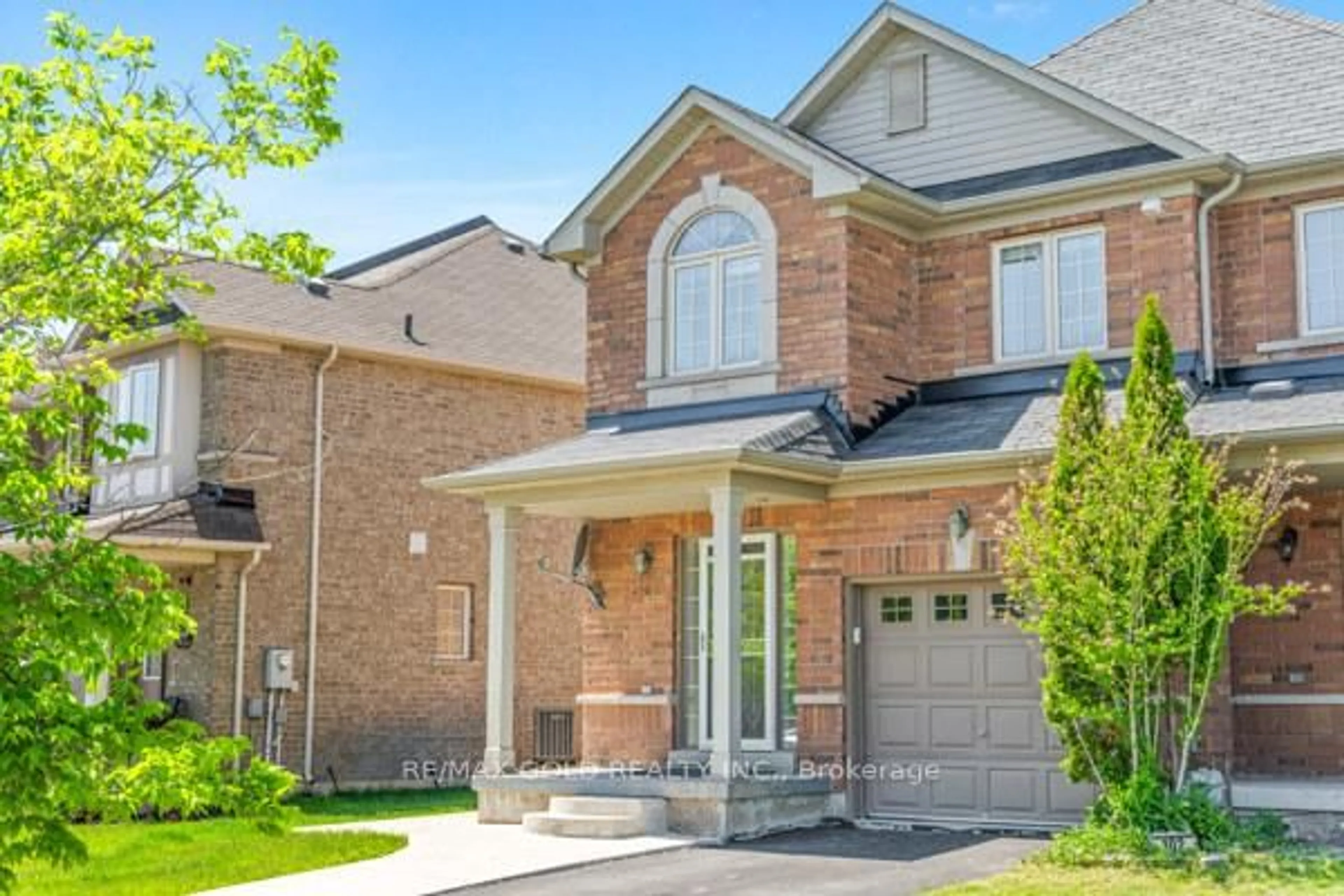 Home with brick exterior material, street for 100 Tomabrook Cres, Brampton Ontario L6R 0V5