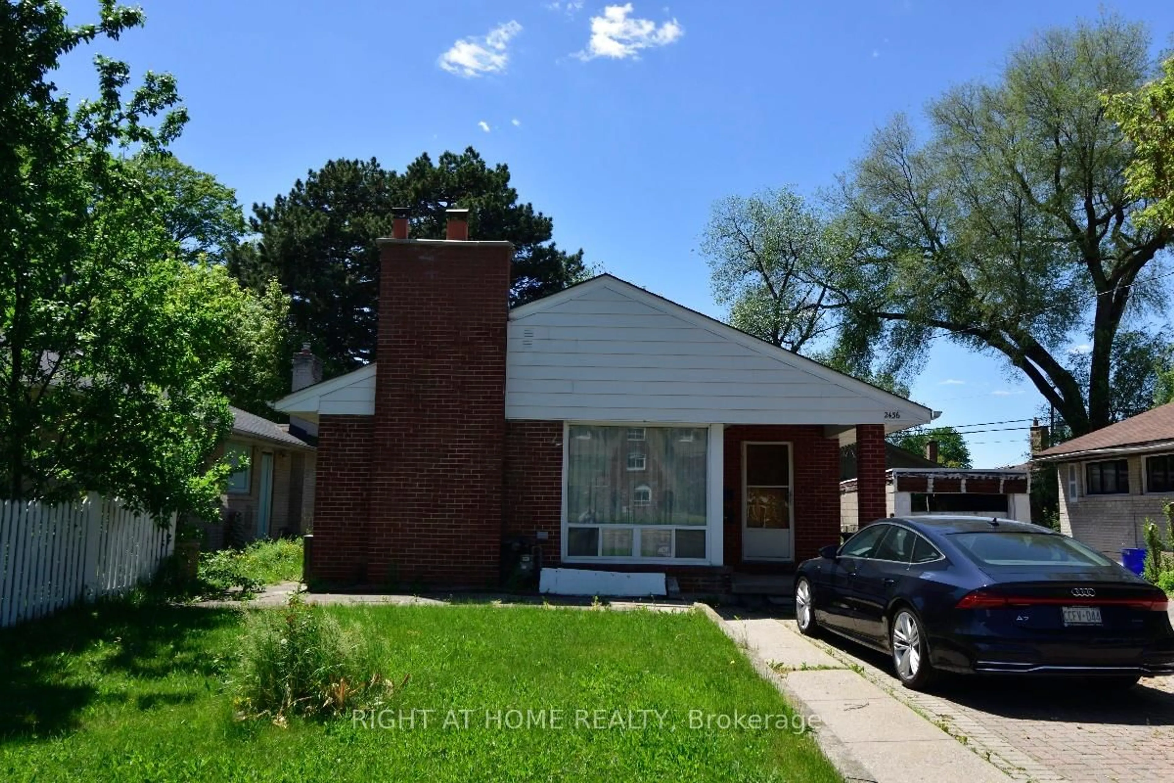 Home with brick exterior material, street for 2436 Islington Ave, Toronto Ontario M9W 3X7