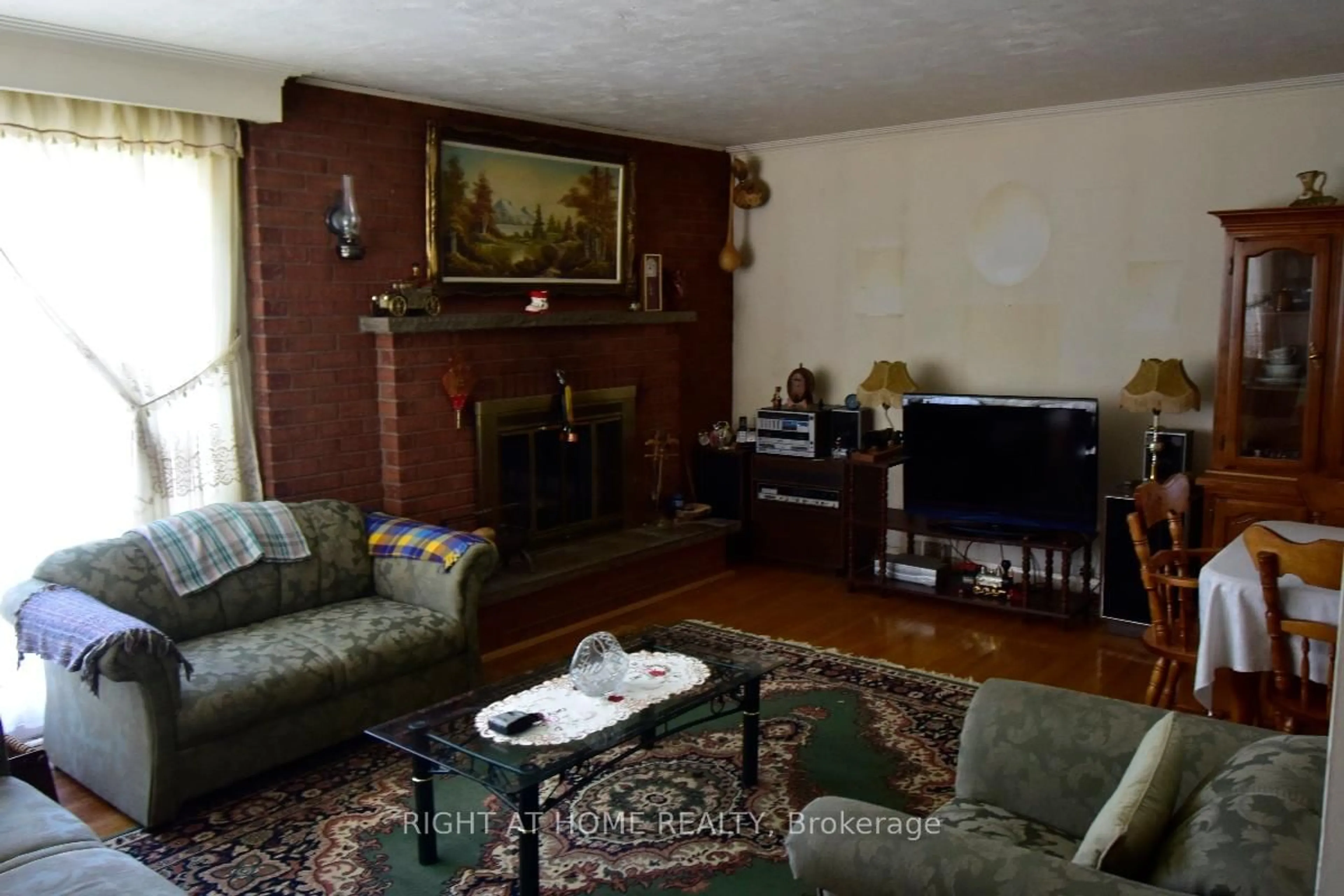 Living room with furniture, unknown for 2436 Islington Ave, Toronto Ontario M9W 3X7