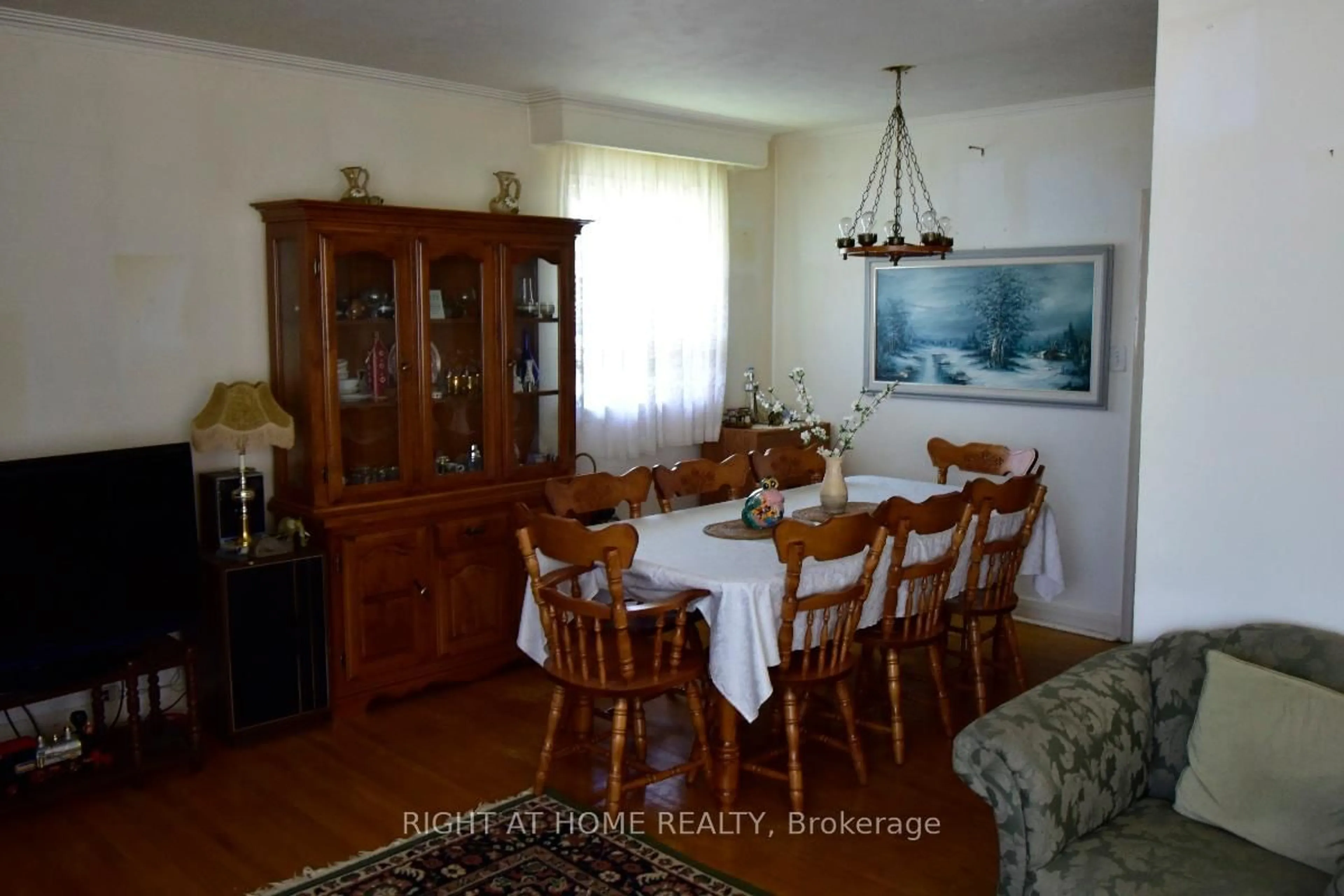Dining room, wood/laminate floor for 2436 Islington Ave, Toronto Ontario M9W 3X7
