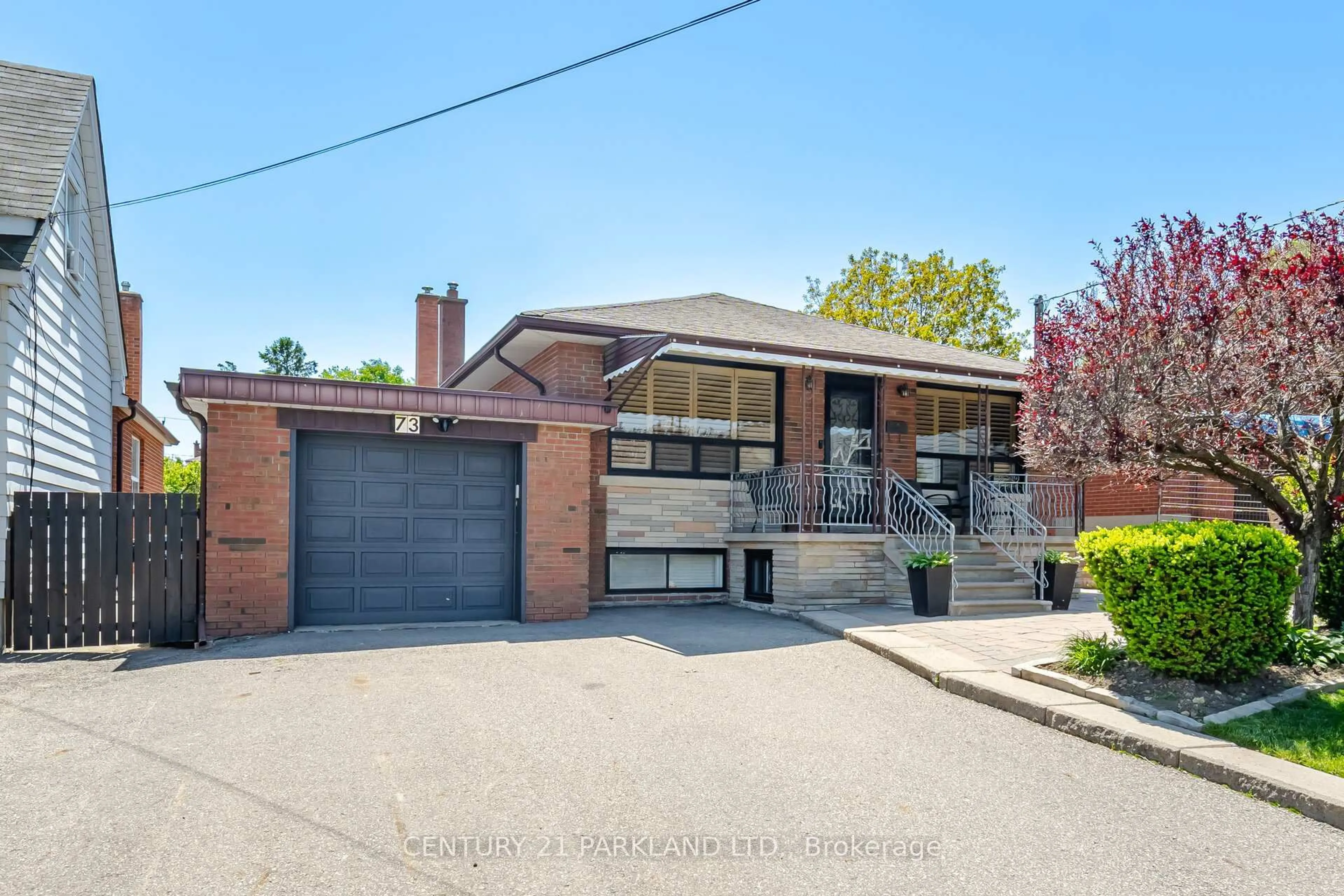 Home with brick exterior material, street for 73 Sunset Tr, Toronto Ontario M9M 1J7