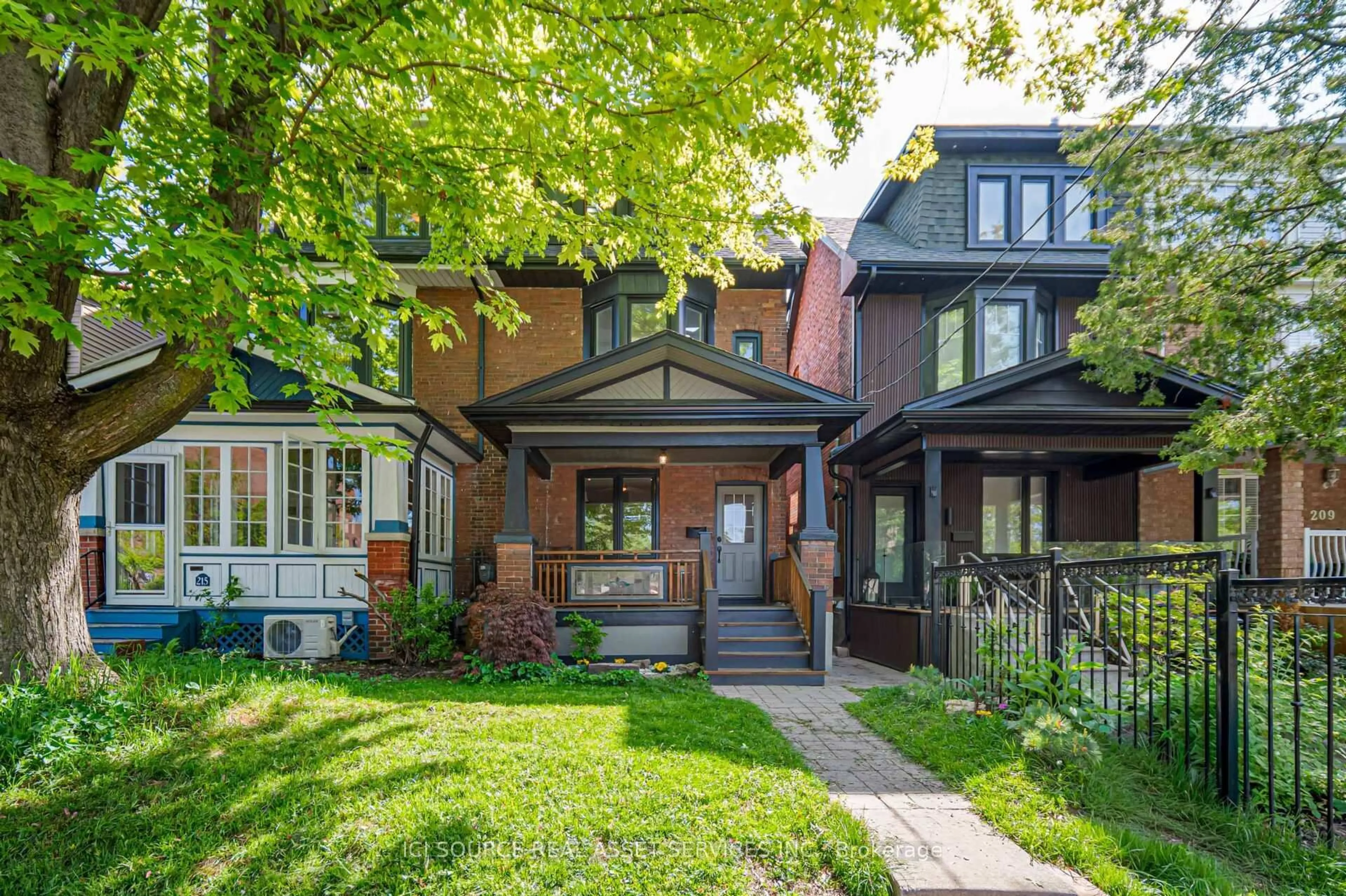 Home with brick exterior material, street for 213 Laughton Ave, Toronto Ontario M6N 2X7