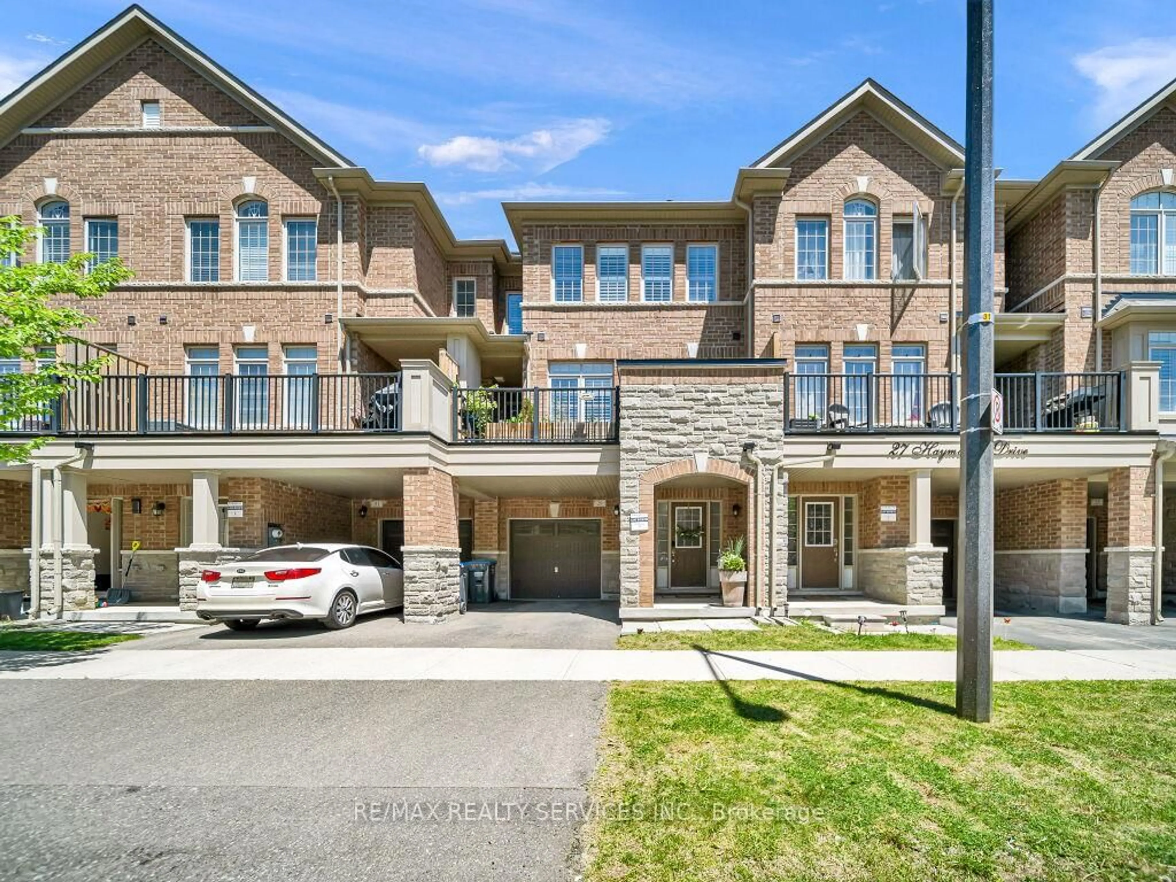 Home with brick exterior material, street for 29 Haymarket Dr, Brampton Ontario L7A 5C3