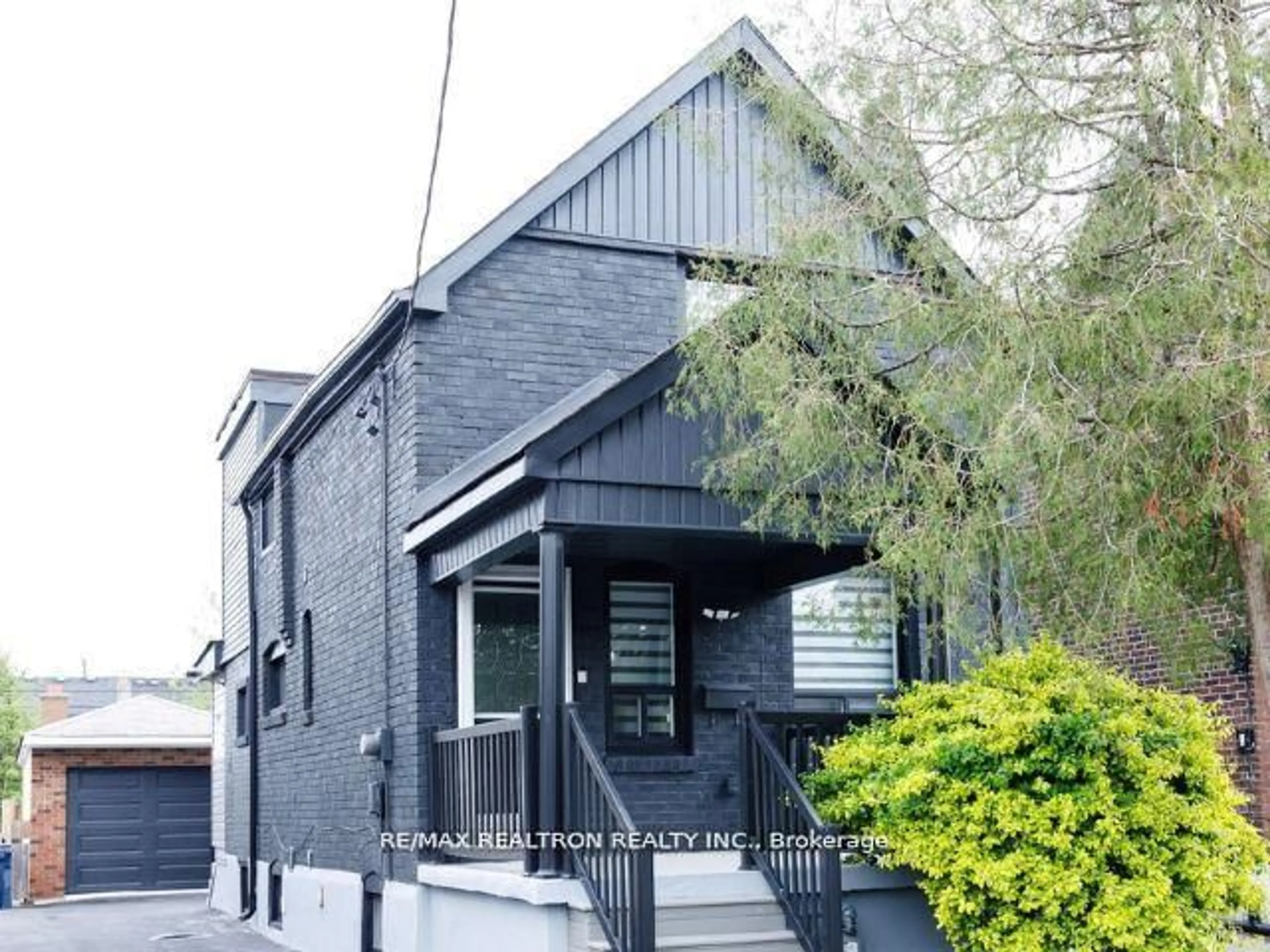 Home with brick exterior material, street for 77 Hatherley Rd, Toronto Ontario M6E 1V8