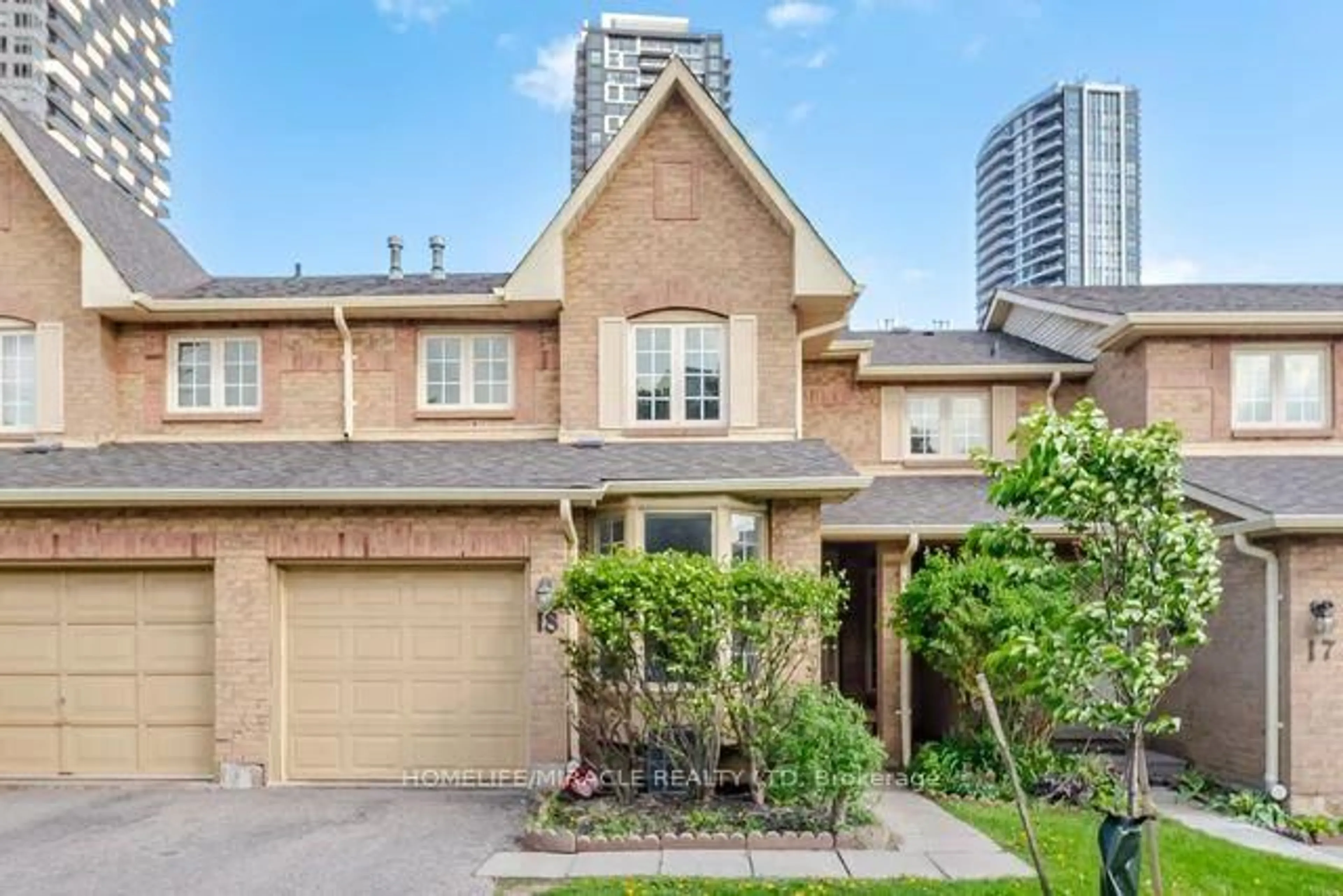 Home with brick exterior material, street for 35 Ceremonial Dr #18, Mississauga Ontario L5R 3G6
