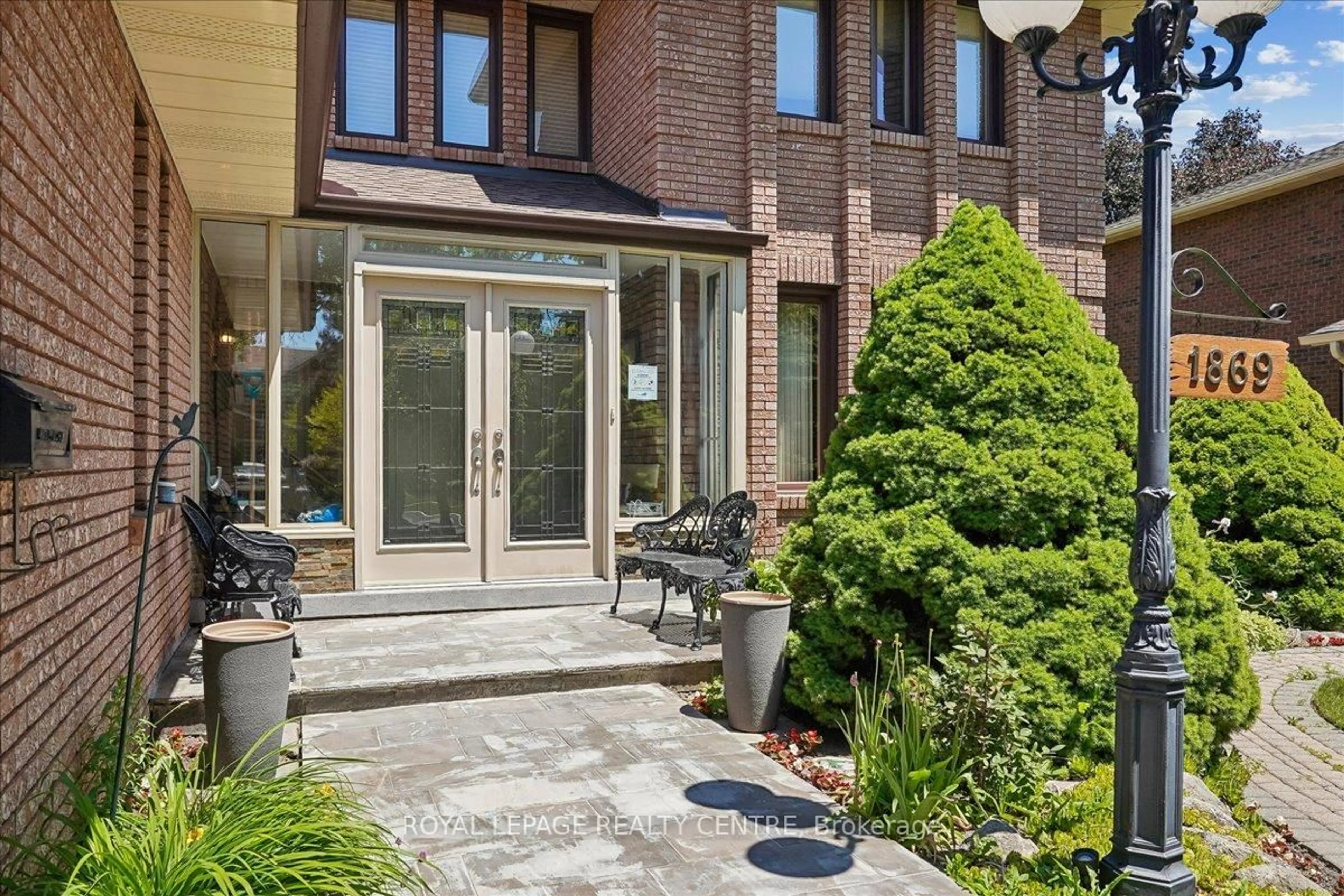 Home with brick exterior material, street for 1869 Folkway Dr, Mississauga Ontario L5L 2X1