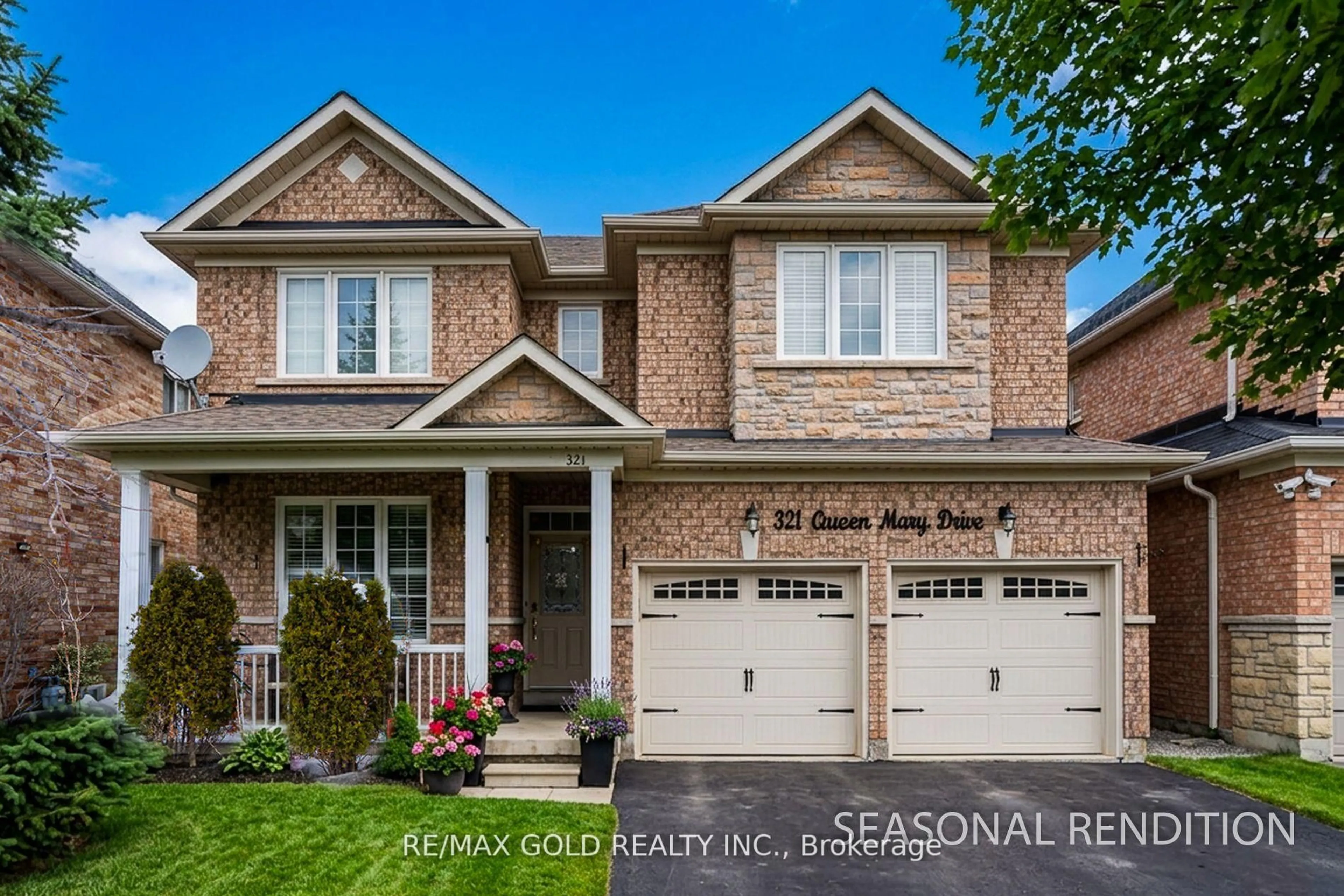 Home with brick exterior material, street for 321 Queen Mary Dr, Brampton Ontario L7A 3S6