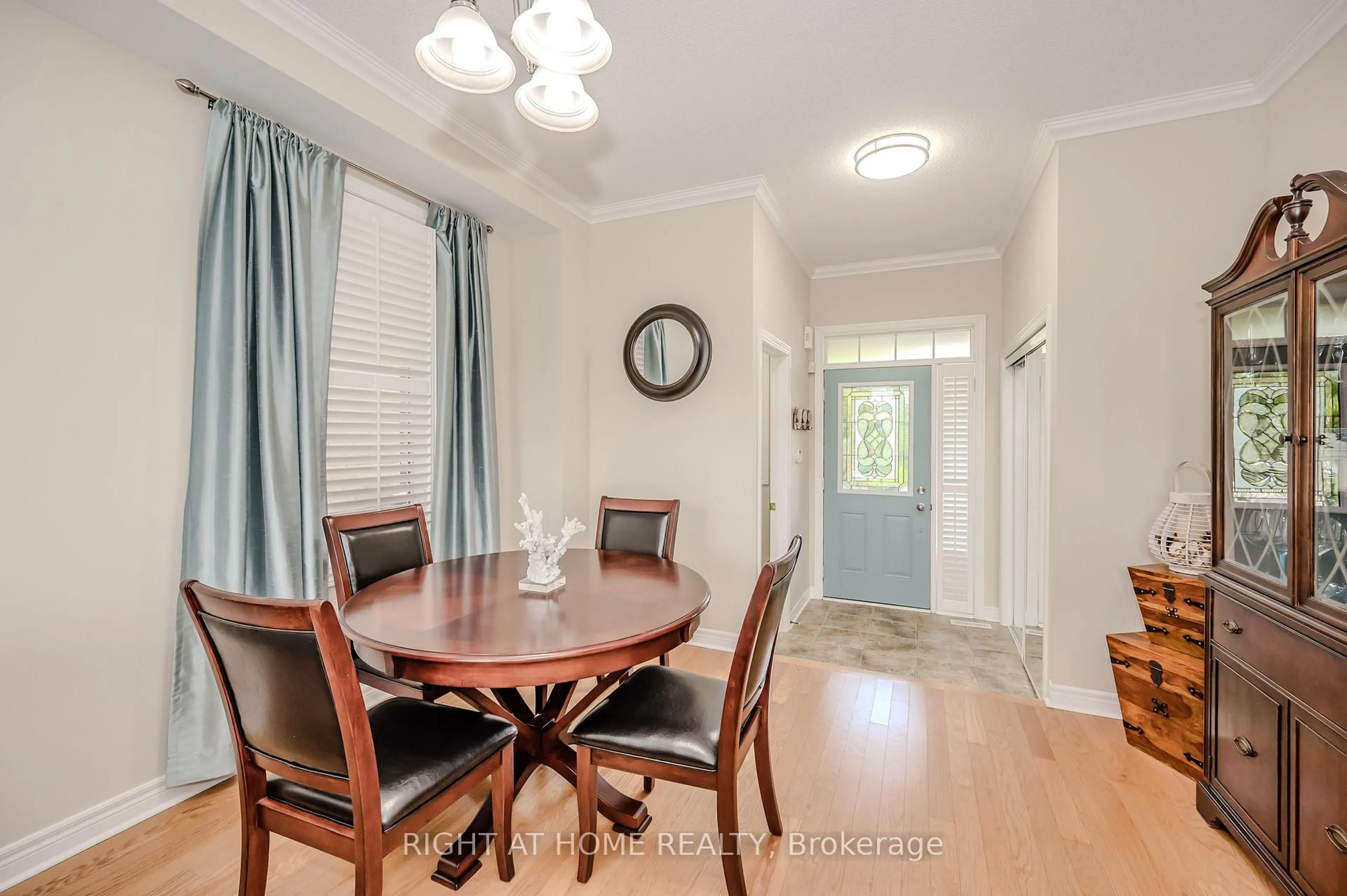 Dining room, wood/laminate floor for 65 Iceland Poppy Tr, Brampton Ontario L7A 0N1