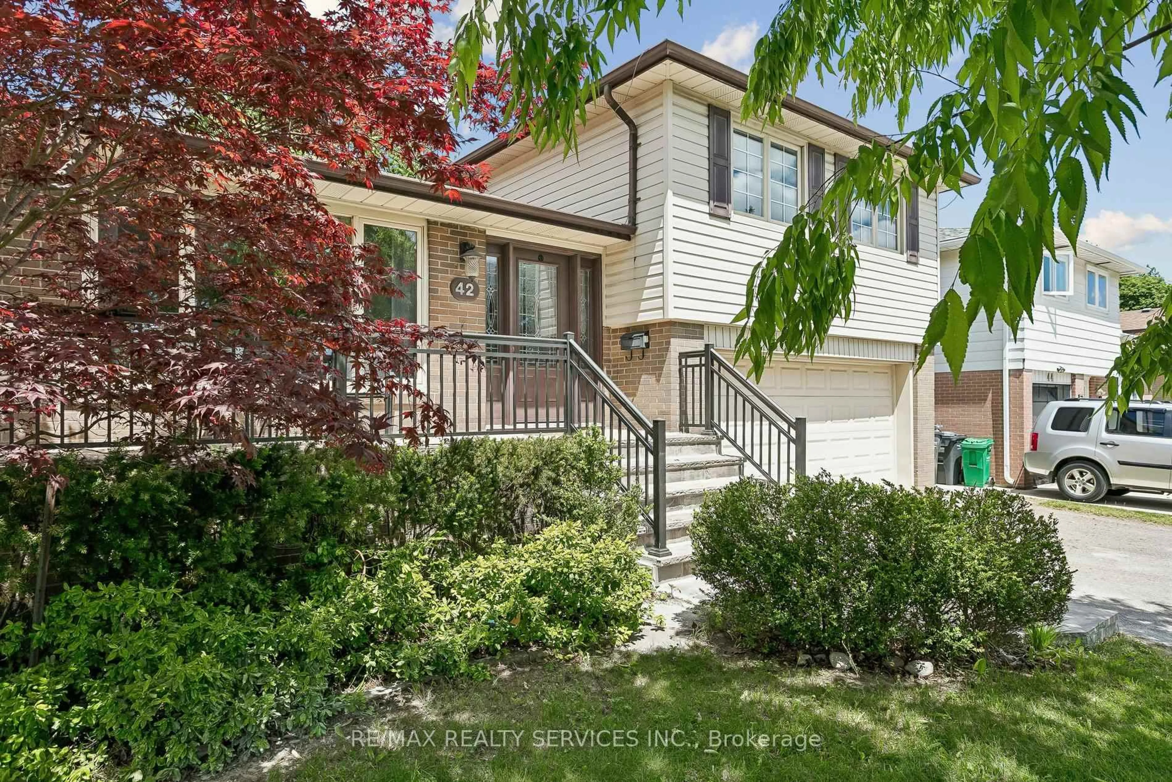 Home with vinyl exterior material, street for 42 Watson Cres, Brampton Ontario L6W 1E7