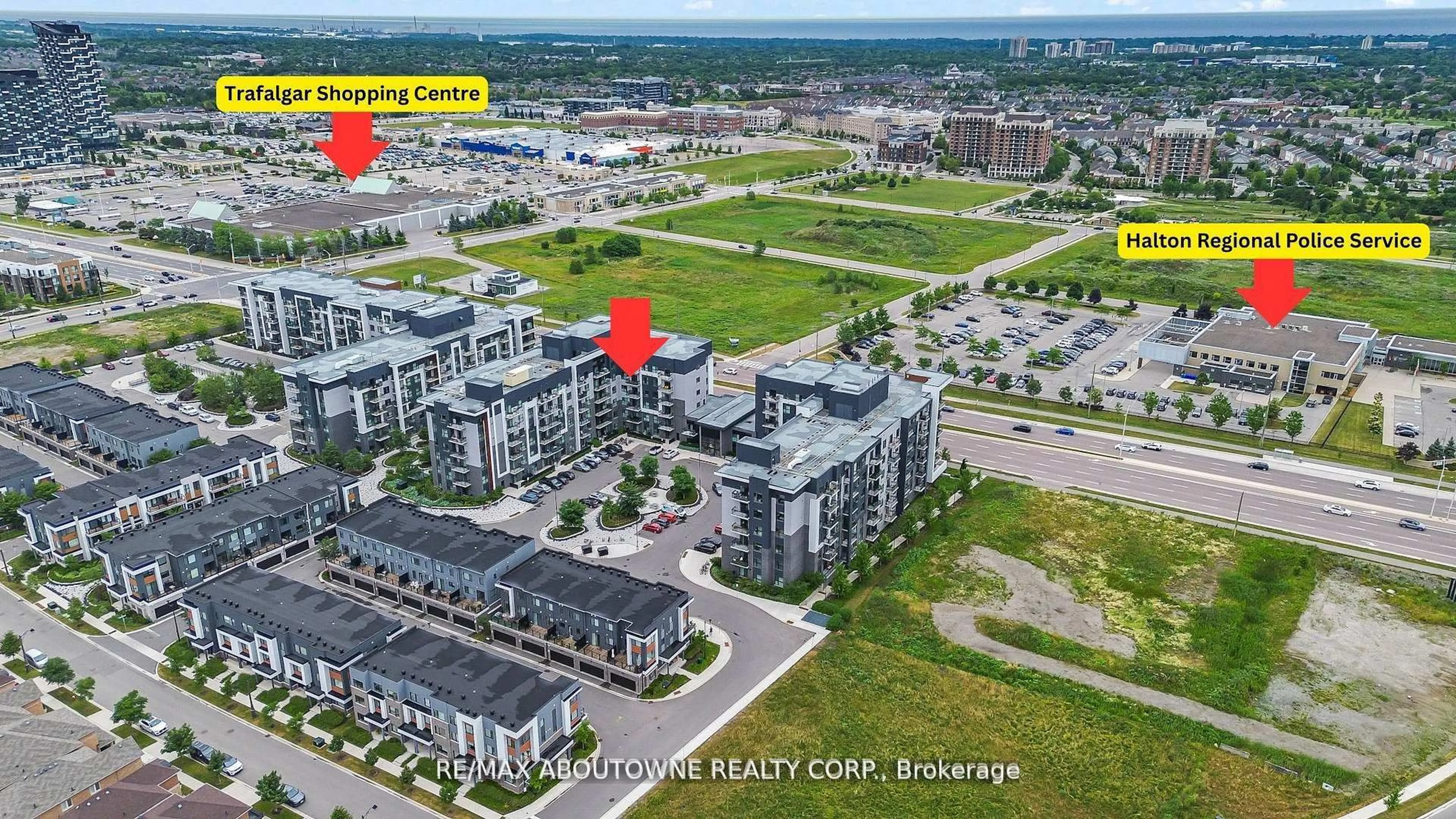 A pic from outside/outdoor area/front of a property/back of a property/a pic from drone, unknown for 102 Grovewood Common #121, Oakville Ontario L6H 0X2