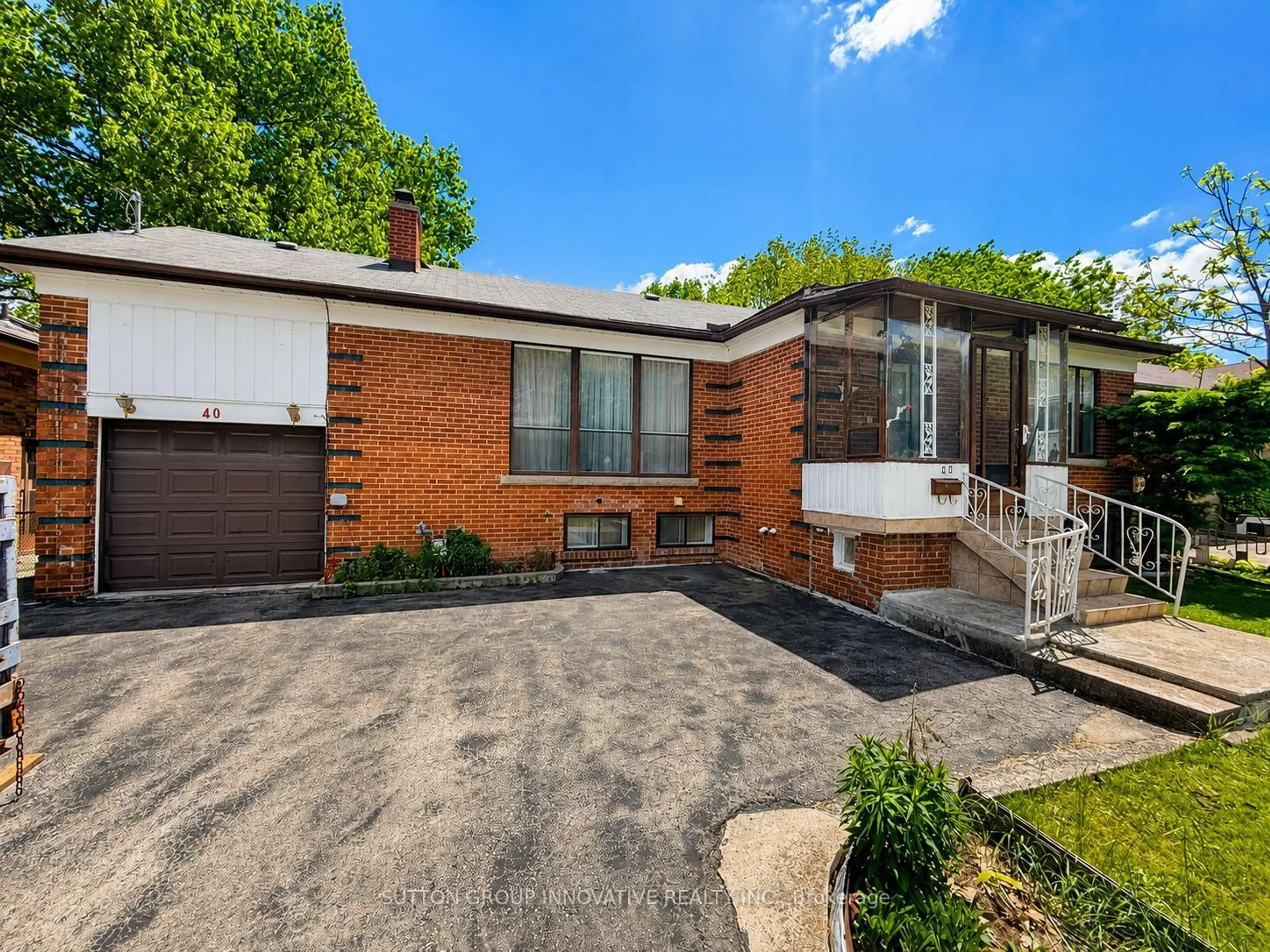 Home with brick exterior material, street for 40 Kingswood Rd, Oakville Ontario L6K 2E3