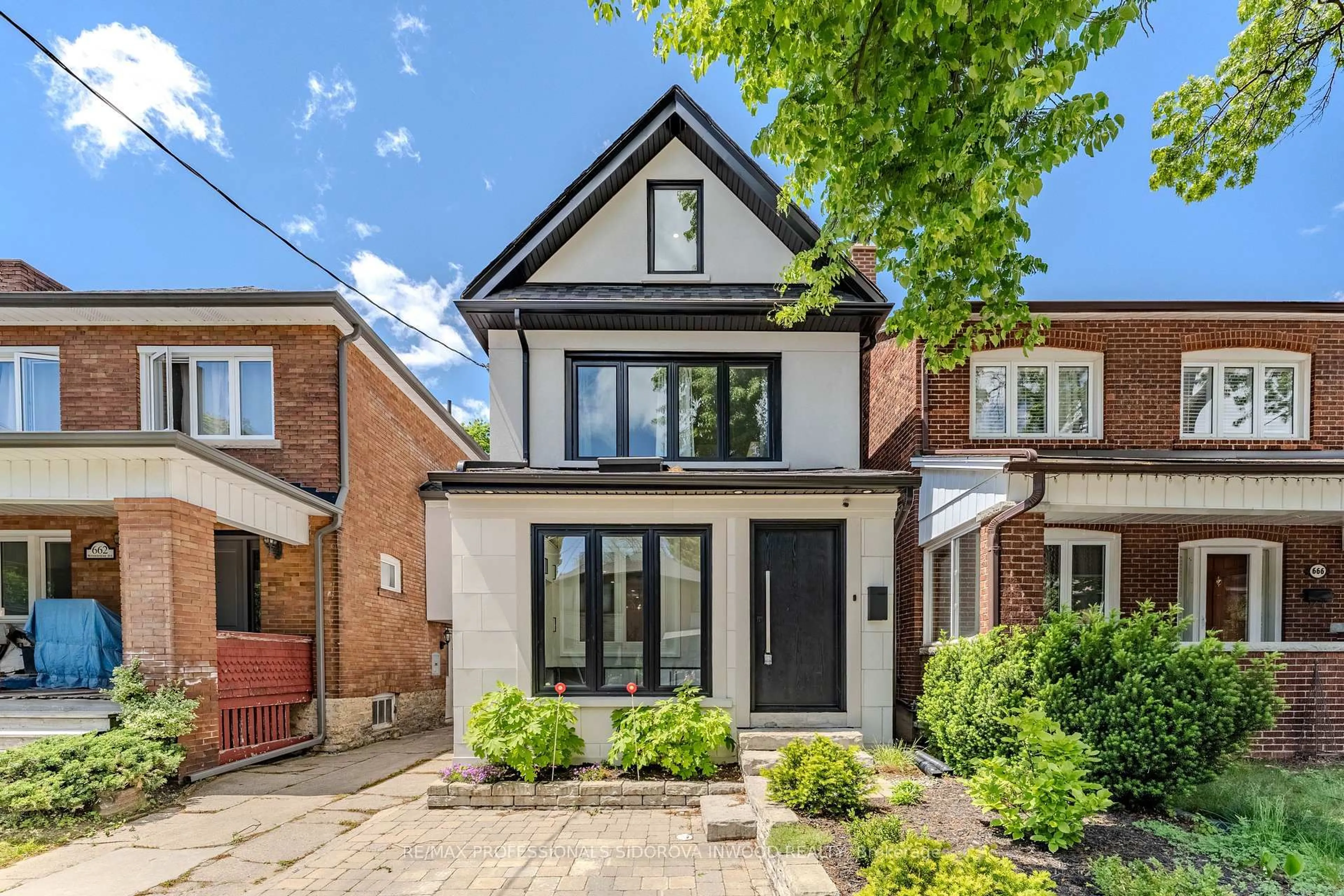 Home with brick exterior material, street for 664 Windermere Ave, Toronto Ontario M6S 3M1