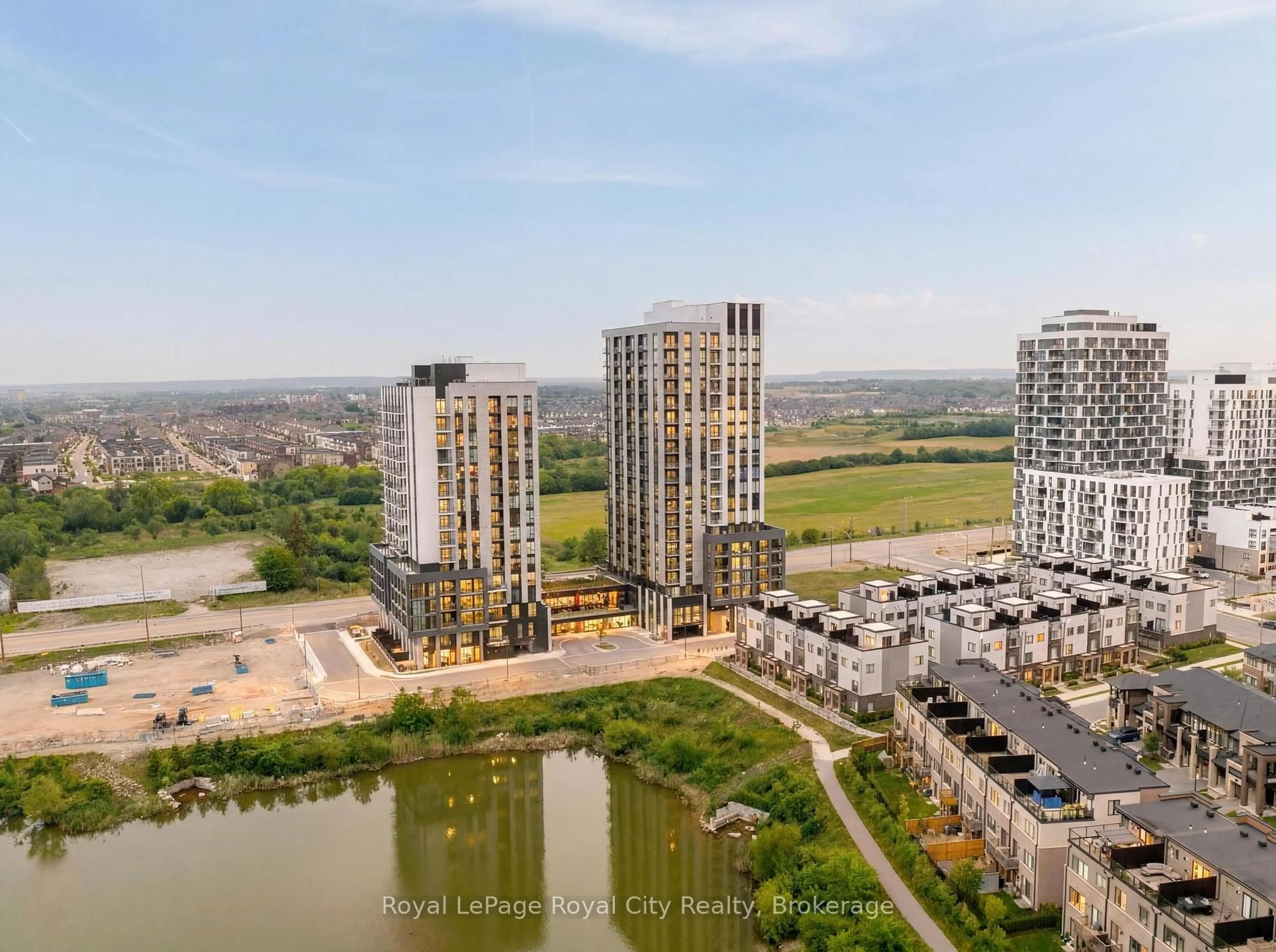A pic from outside/outdoor area/front of a property/back of a property/a pic from drone, city buildings view from balcony for 3071 Trafalgar Rd #604, Oakville Ontario L6H 8C6
