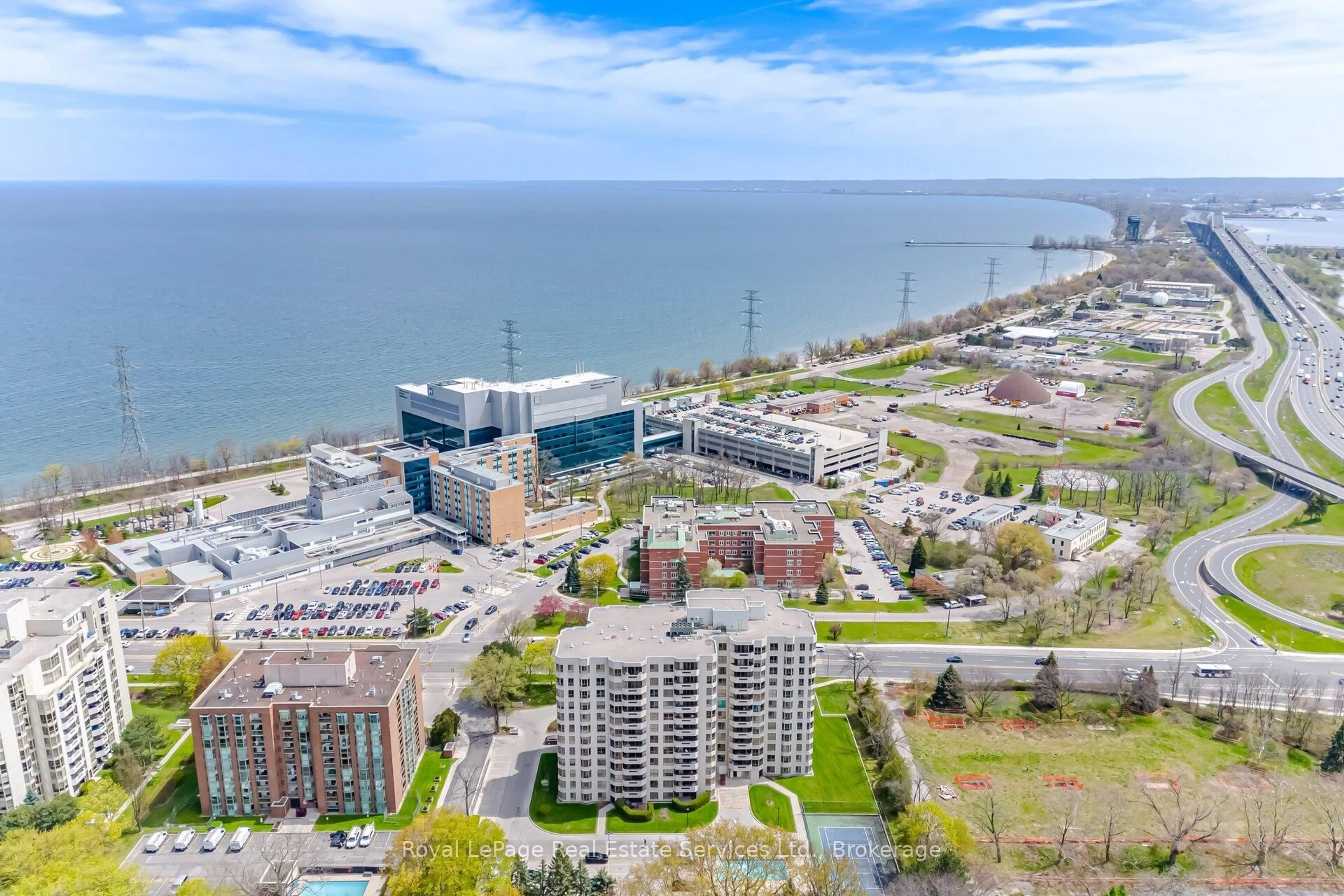 A pic from outside/outdoor area/front of a property/back of a property/a pic from drone, water/lake/river/ocean view for 1201 North Shore Blvd #1001, Burlington Ontario L7S 1Z5