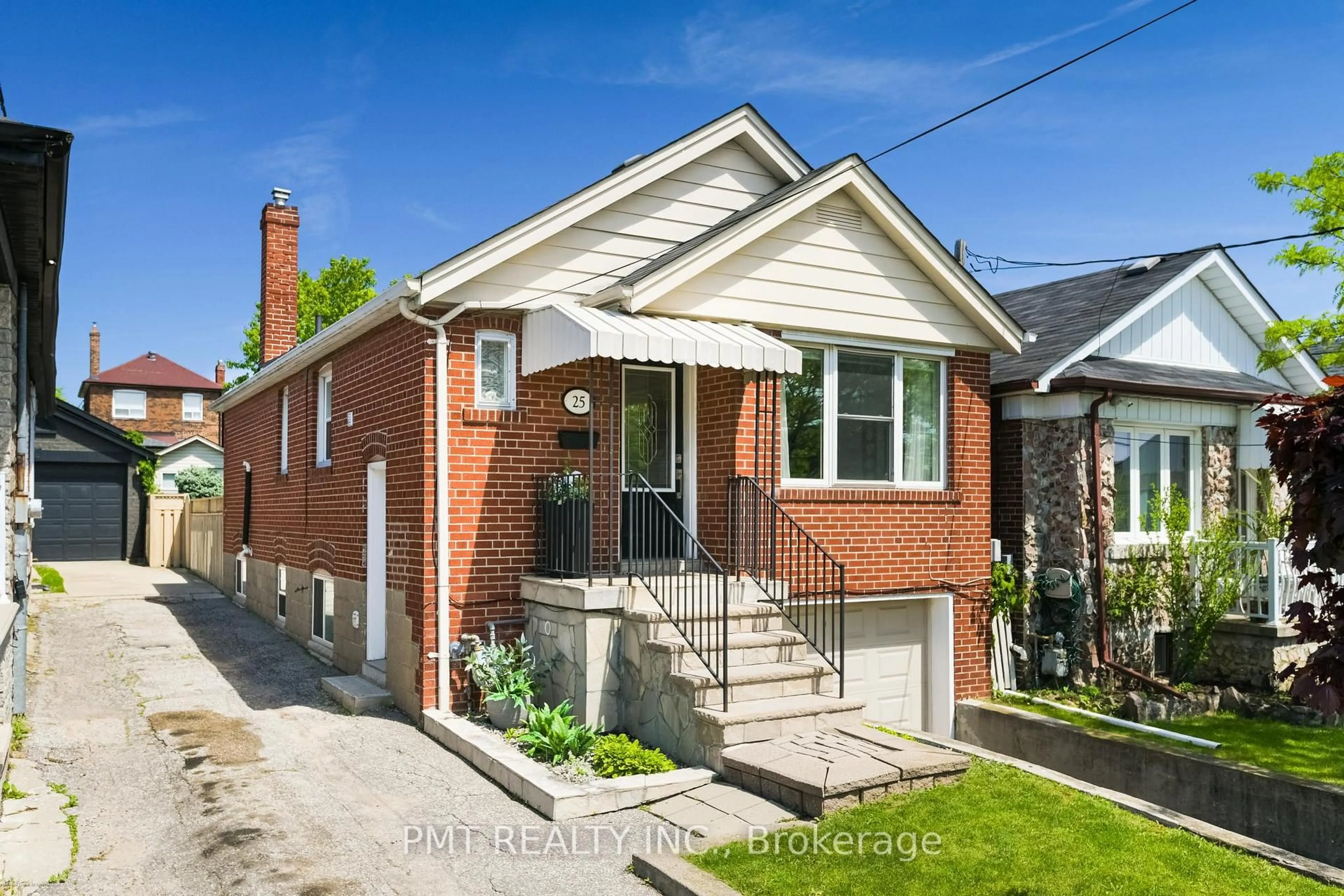 Home with brick exterior material, street for 25 Ronald Ave, Toronto Ontario M6E 4M5