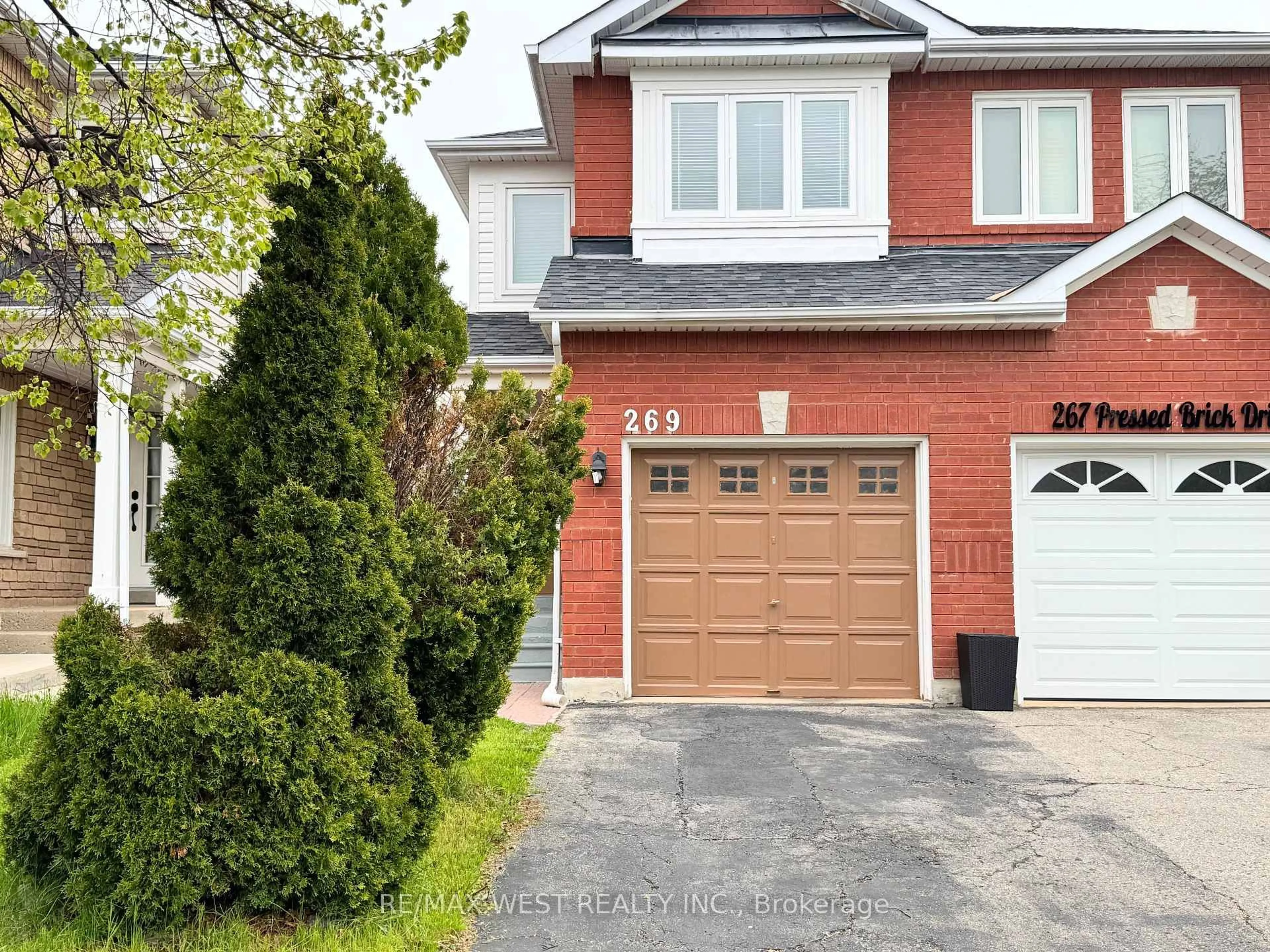 Home with brick exterior material, street for 269 Pressed Brick Dr, Brampton Ontario L6V 4L2