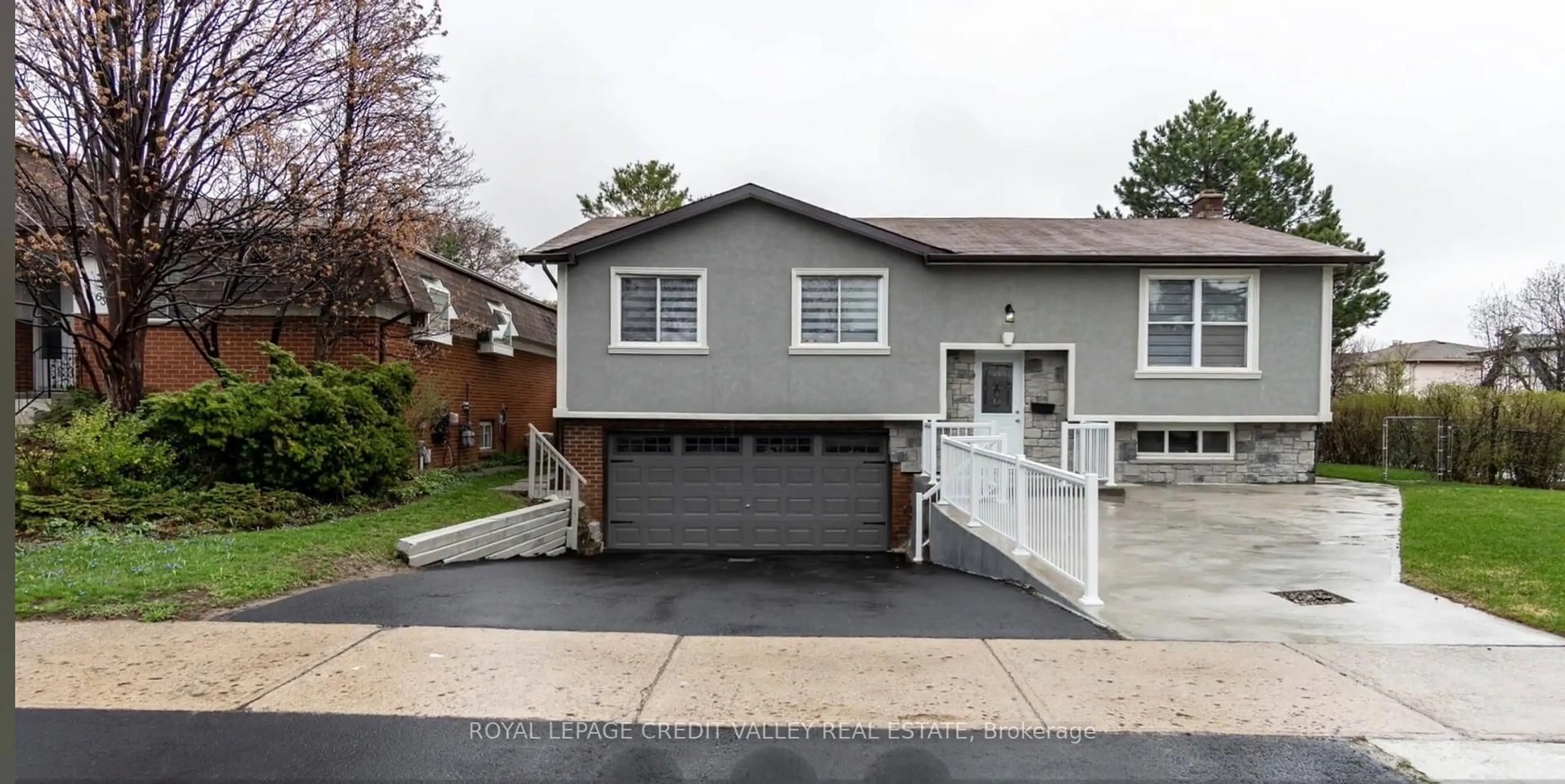 Home with vinyl exterior material, street for 65 Abell Dr, Brampton Ontario L6V 2W1