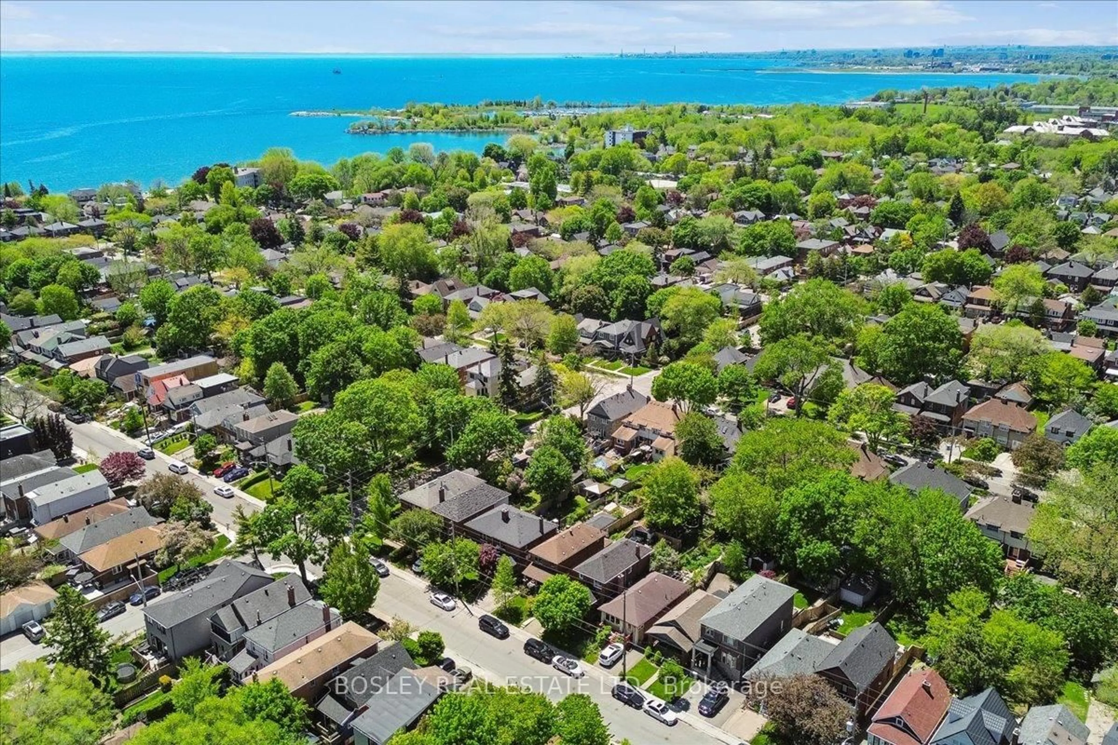 A pic from outside/outdoor area/front of a property/back of a property/a pic from drone, water/lake/river/ocean view for 92 Seventh St, Toronto Ontario M8V 3B4