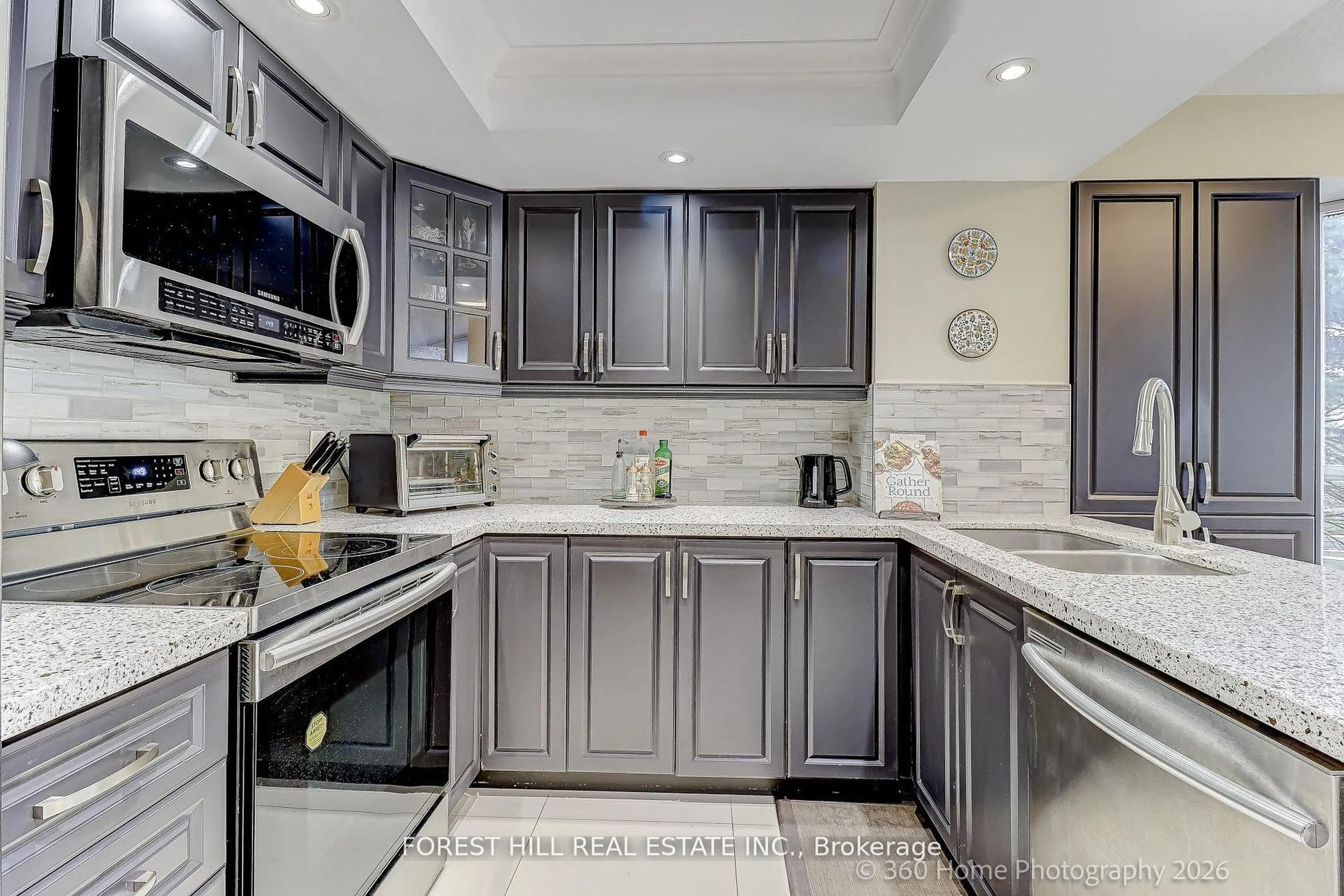 Contemporary kitchen, ceramic/tile floor for 45 Kingsbridge Garden Circ #204, Mississauga Ontario L5R 3K4