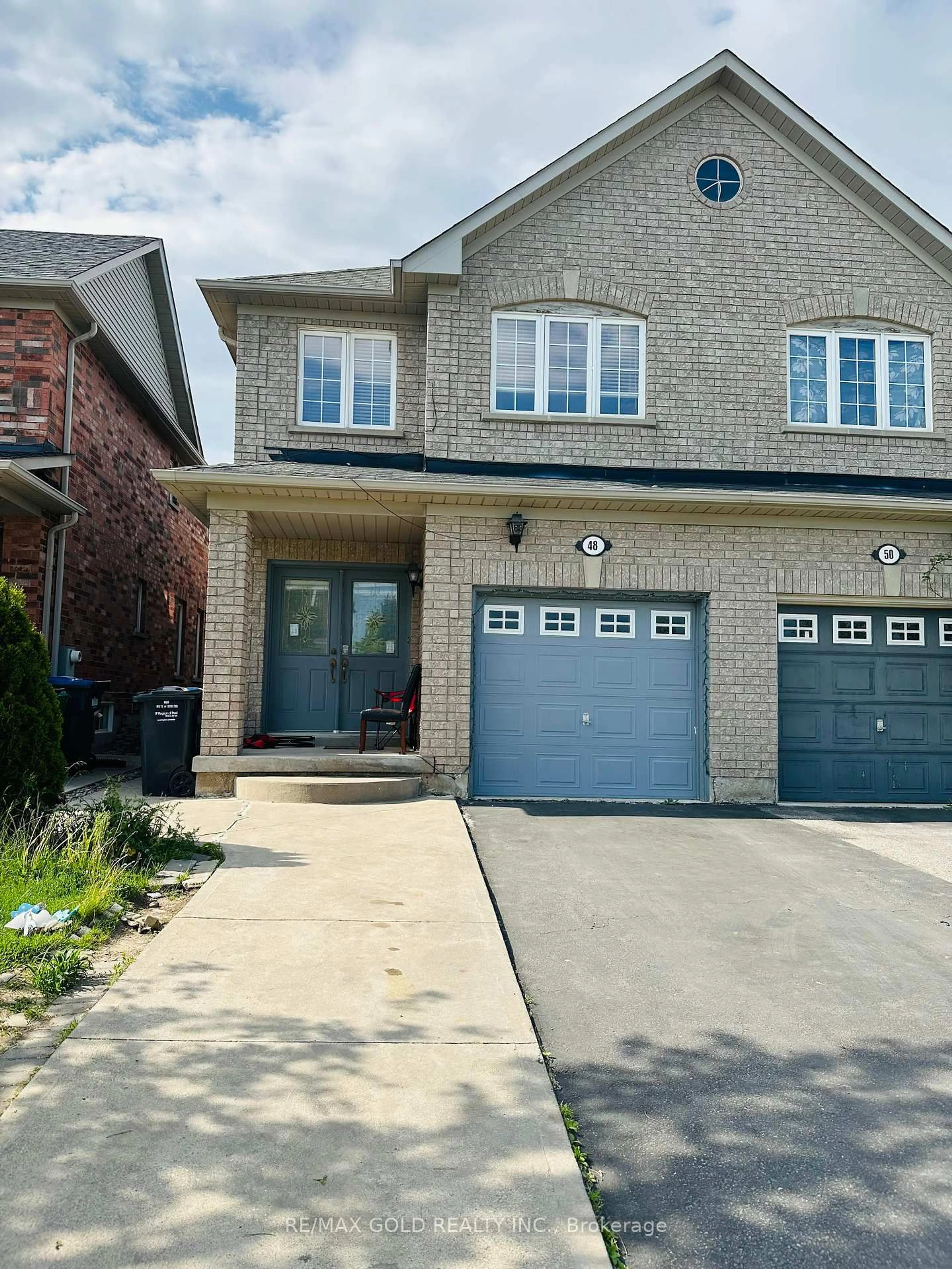 Home with brick exterior material, street for 48 Sugarberry Dr, Brampton Ontario L6X 0K2