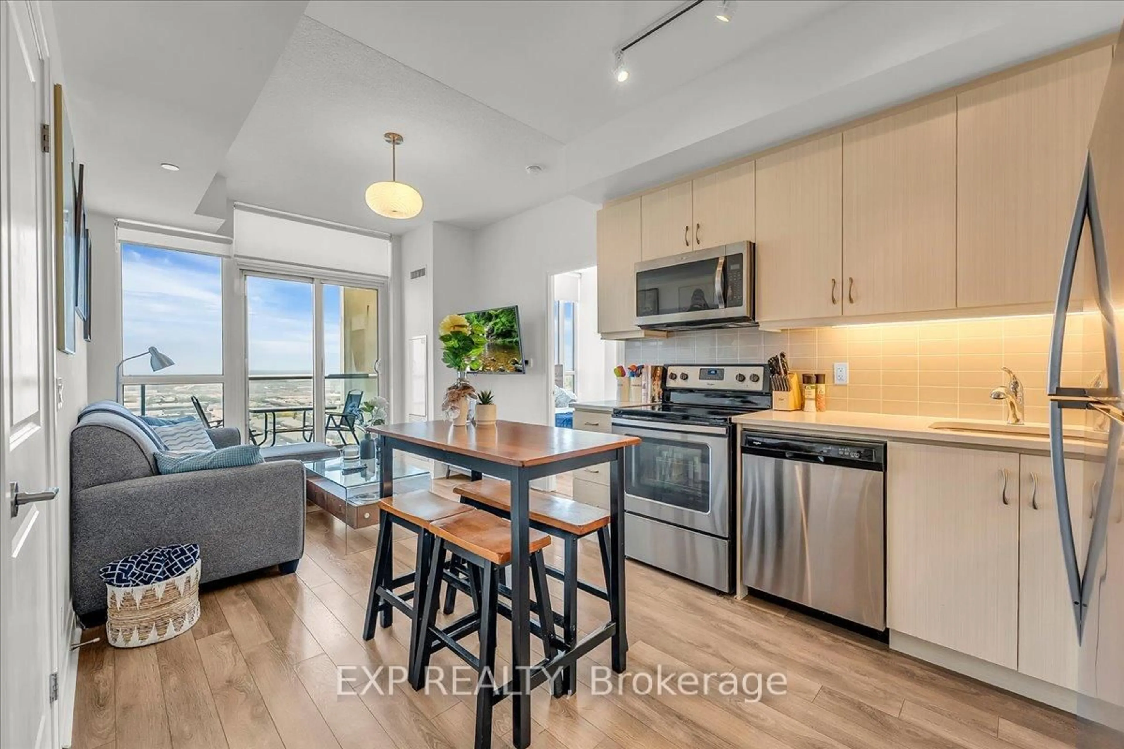 Open concept kitchen, wood/laminate floor for 17 Zorra St #1509, Toronto Ontario M8Z 0C8