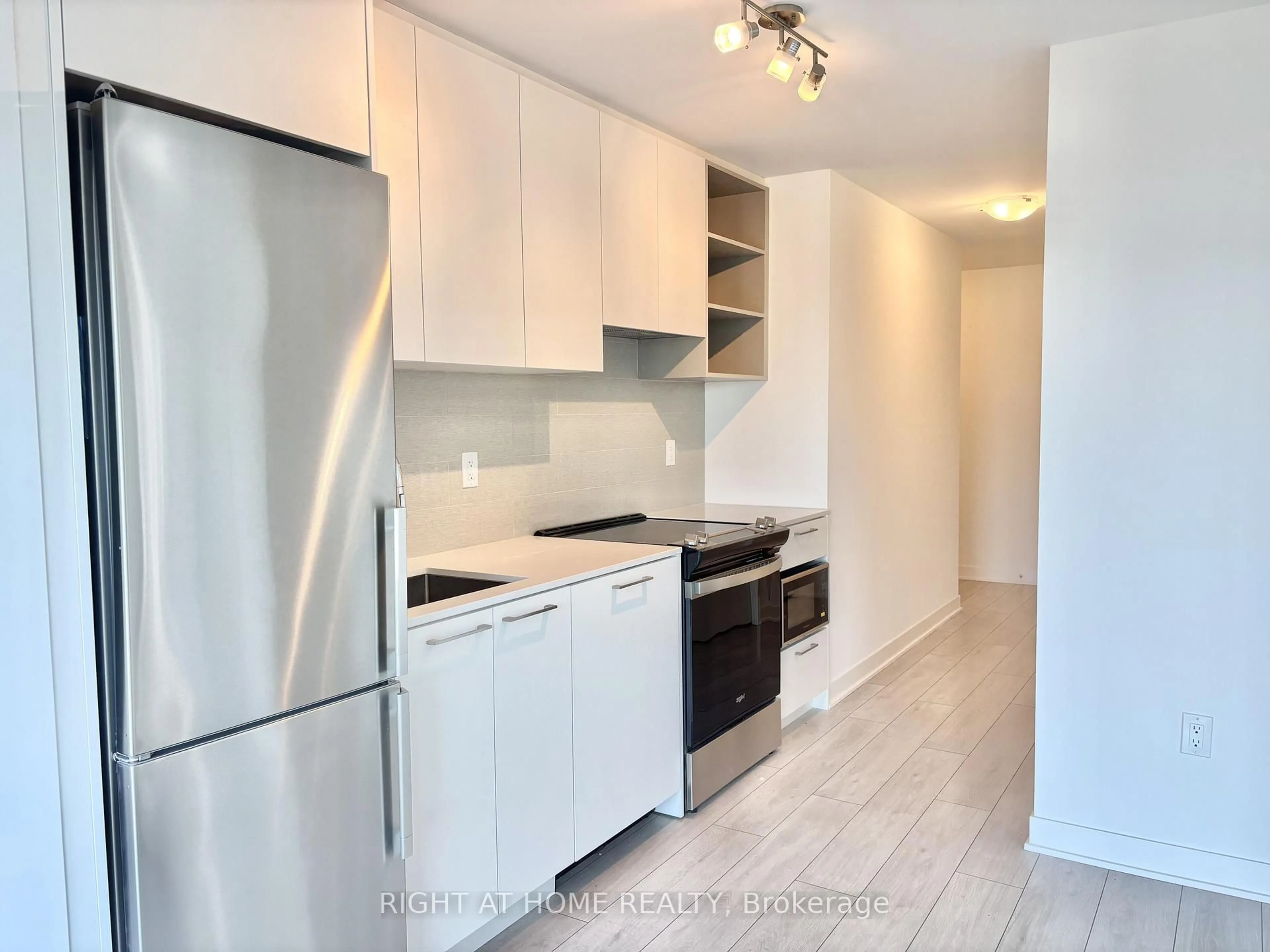 Standard kitchen, wood/laminate floor for 260 Malta Ave #506, Brampton Ontario L6Y 6L7