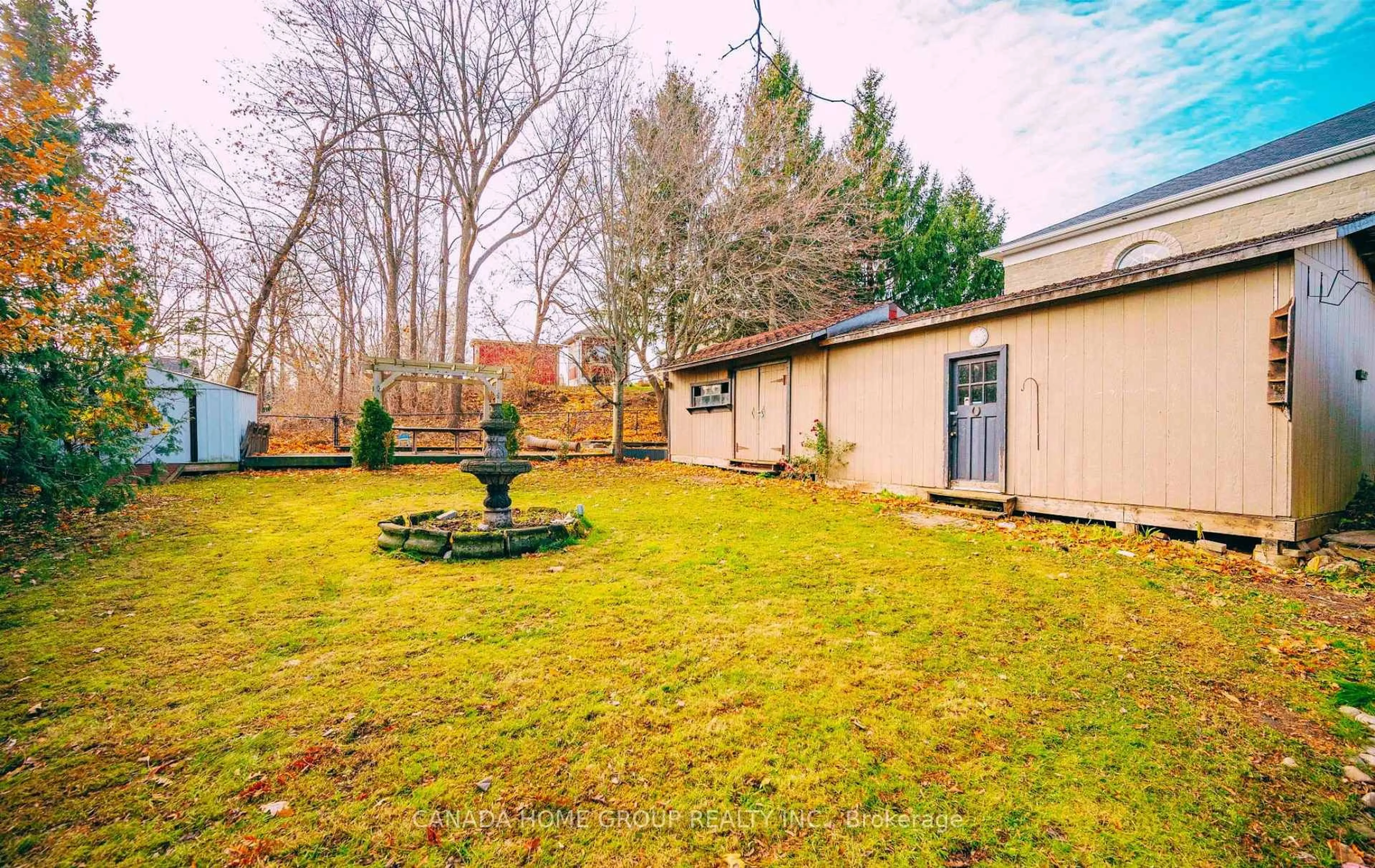 A pic from outside/outdoor area/front of a property/back of a property/a pic from drone, forest/trees view for 30 Main St, Milton Ontario L0P 1B0