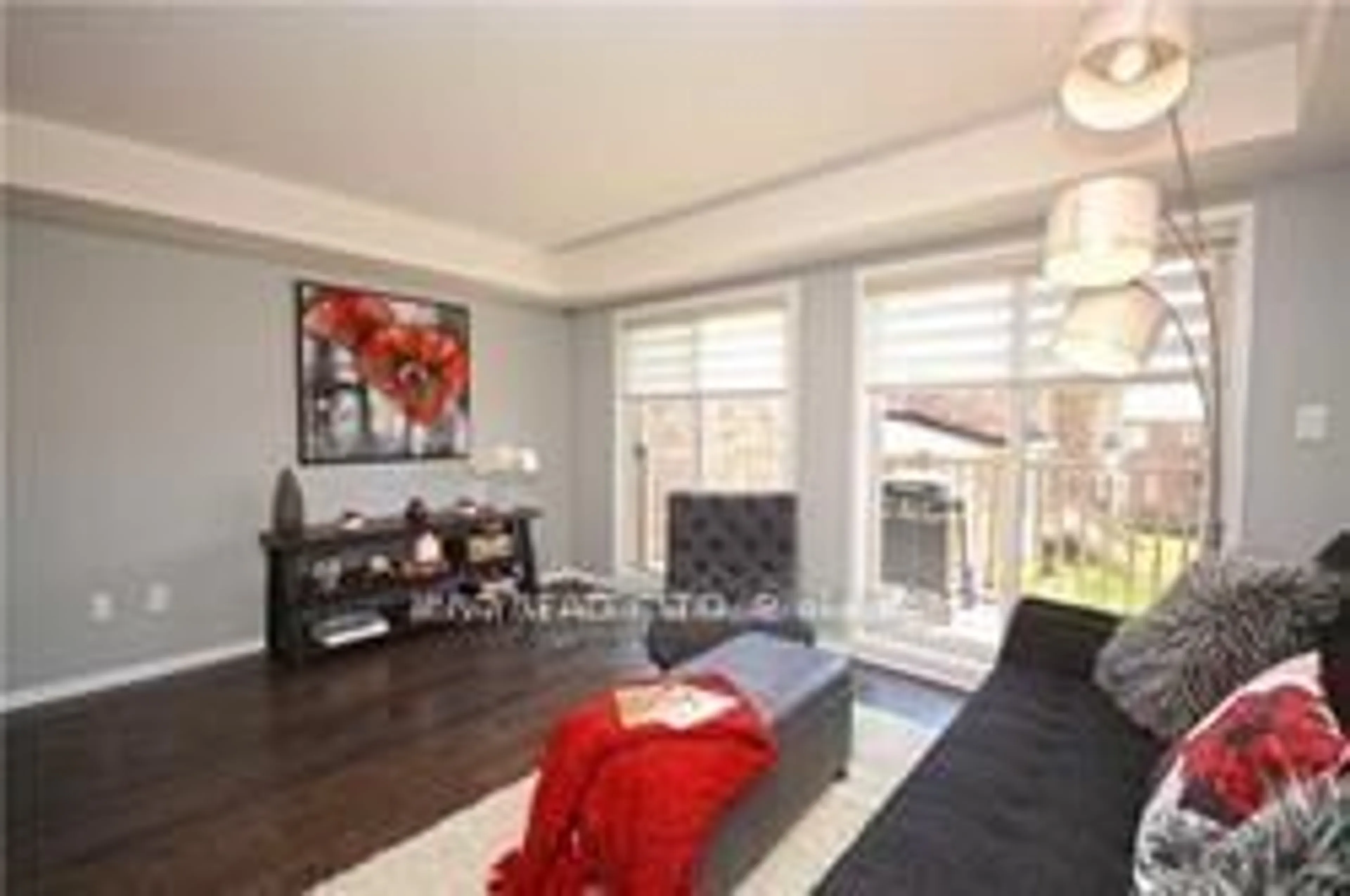Living room with furniture, wood/laminate floor for 5615 Oscar Peterson Blvd #3, Mississauga Ontario L5M 0T2