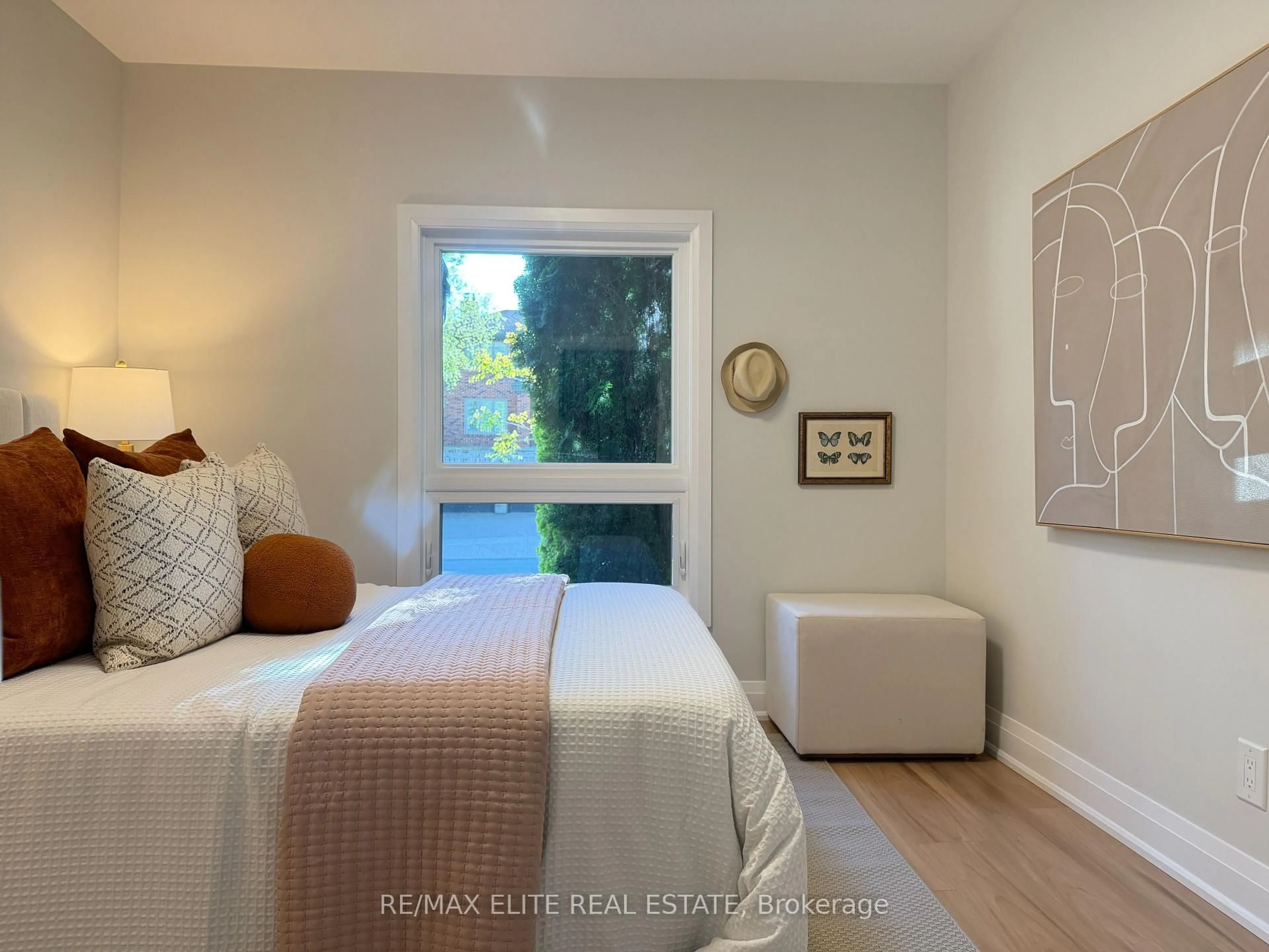 Bedroom with bed, wood/laminate floor for 9 Woodford Park Rd, Toronto Ontario M8Y 3E7