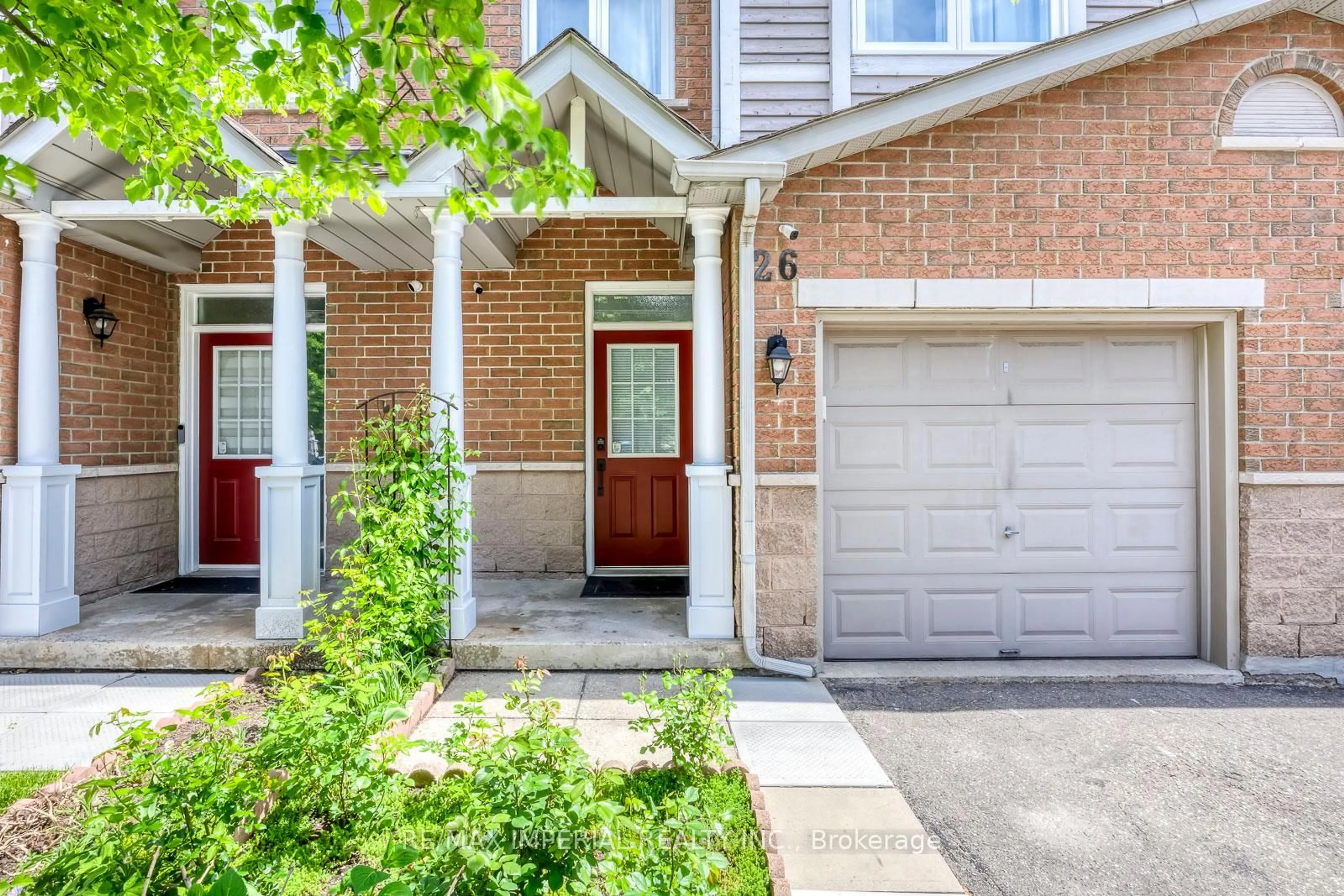 Home with brick exterior material, street for 833 Scollard Crt #26, Mississauga Ontario L5V 2B4
