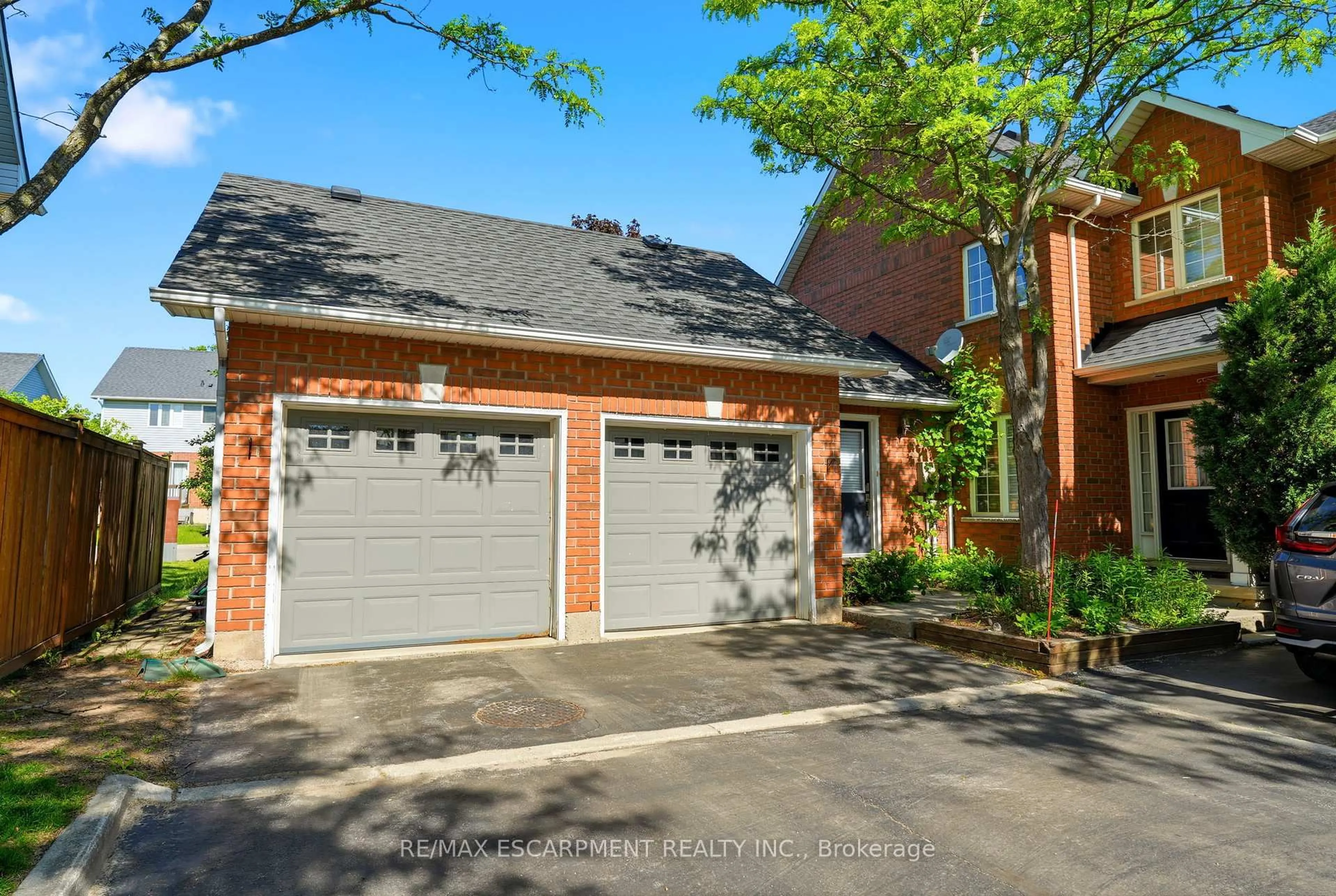 Home with brick exterior material, street for 1745 Creek Way #7, Burlington Ontario L7L 7E1