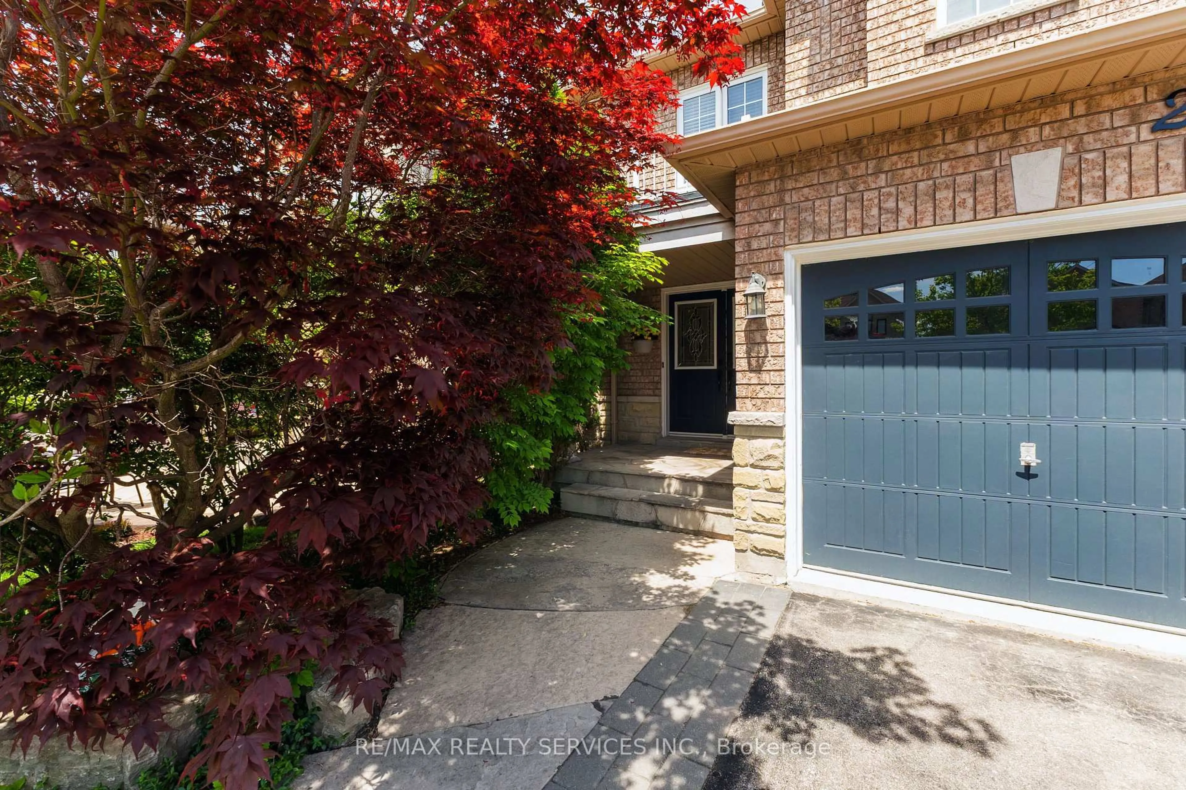 Home with brick exterior material, street for 295 Queen Mary Dr, Brampton Ontario L7A 3R1