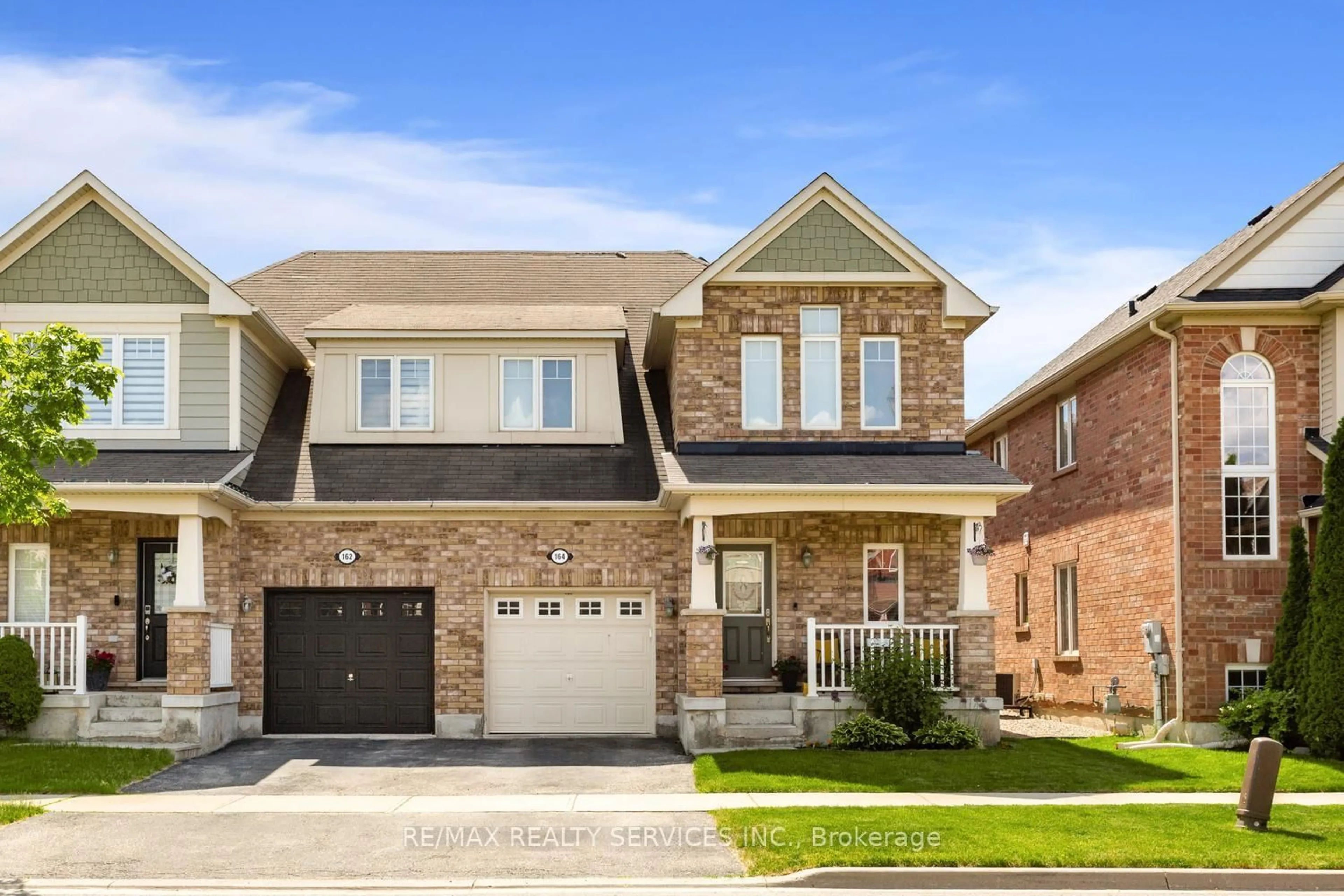 Home with brick exterior material, street for 164 Mcdougall Cross, Milton Ontario L9T 0P7