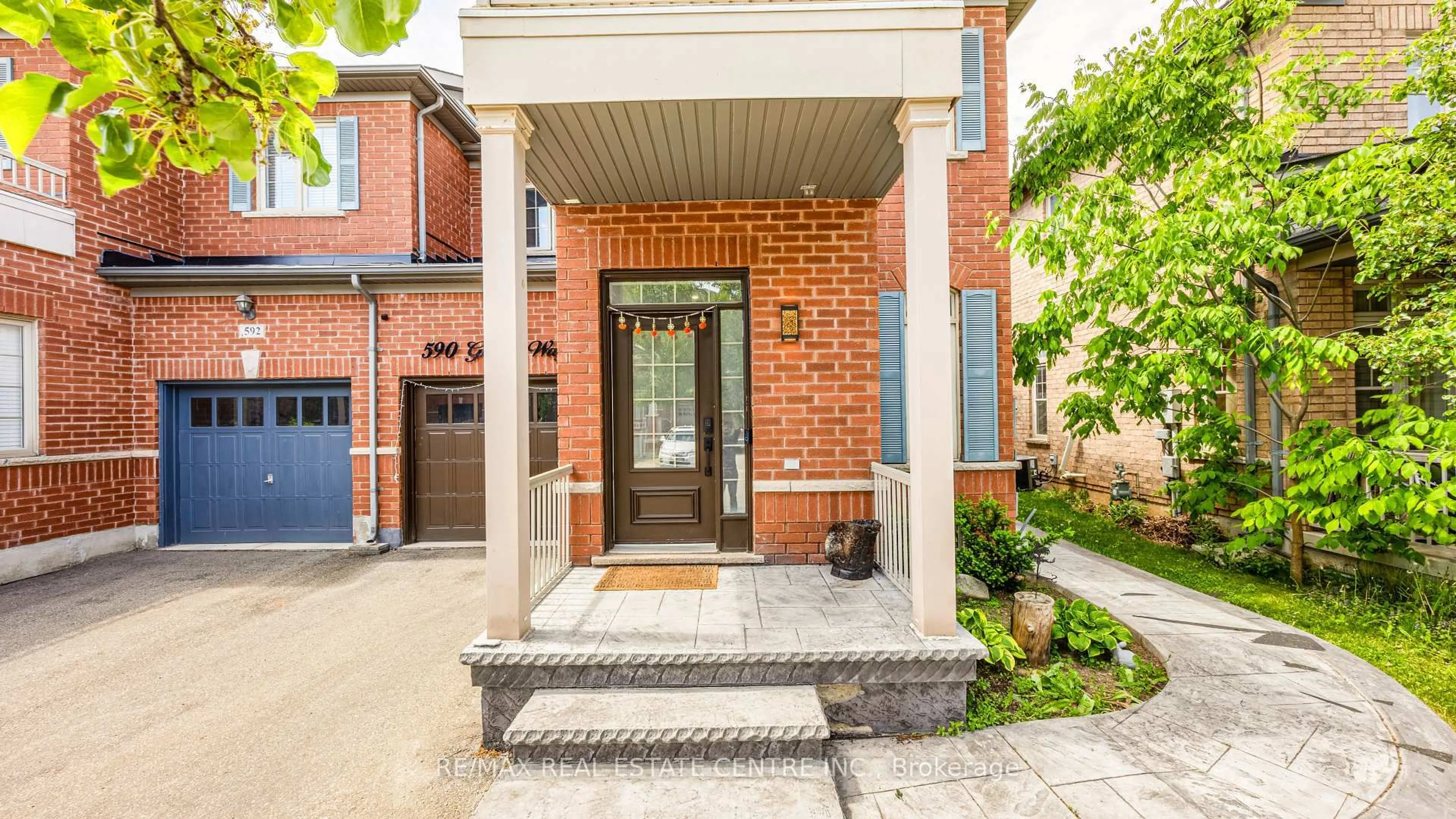 Home with brick exterior material, street for 590 Grant Way, Milton Ontario L9T 0W1