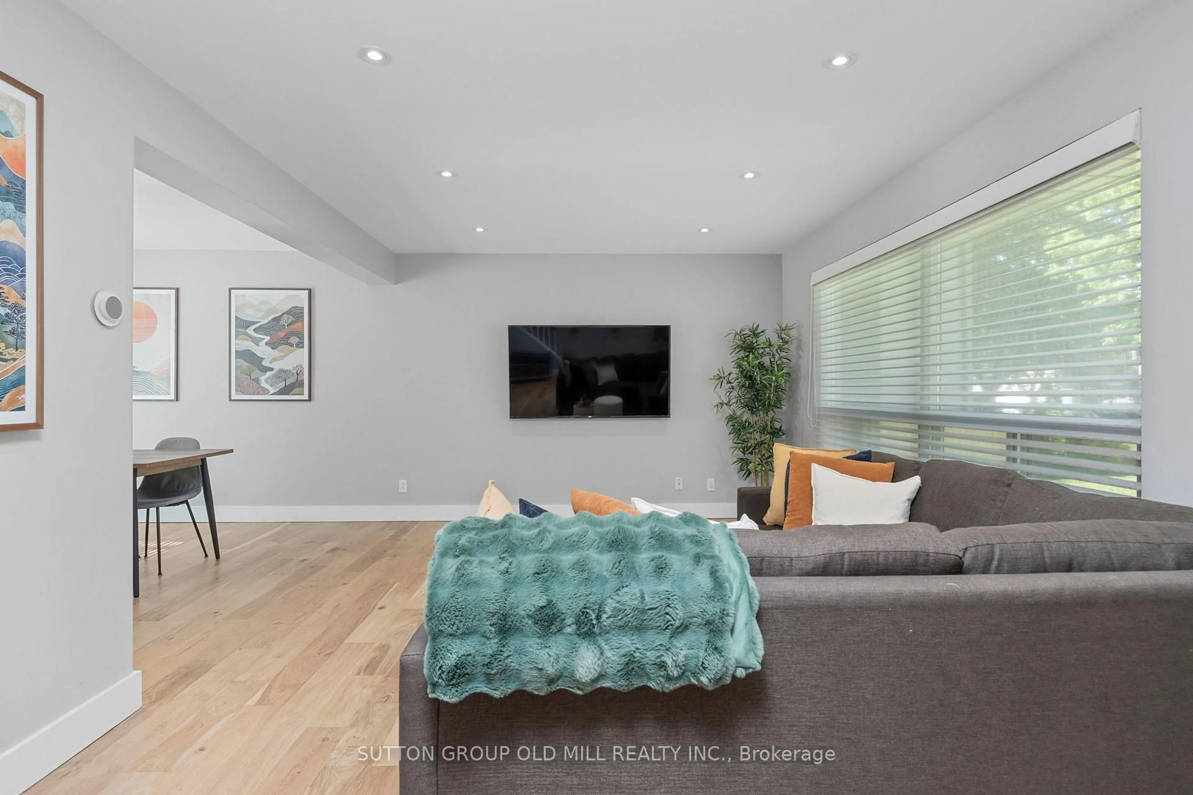 Living room with furniture, wood/laminate floor for 47 Ashfield Dr, Toronto Ontario M9C 4T7