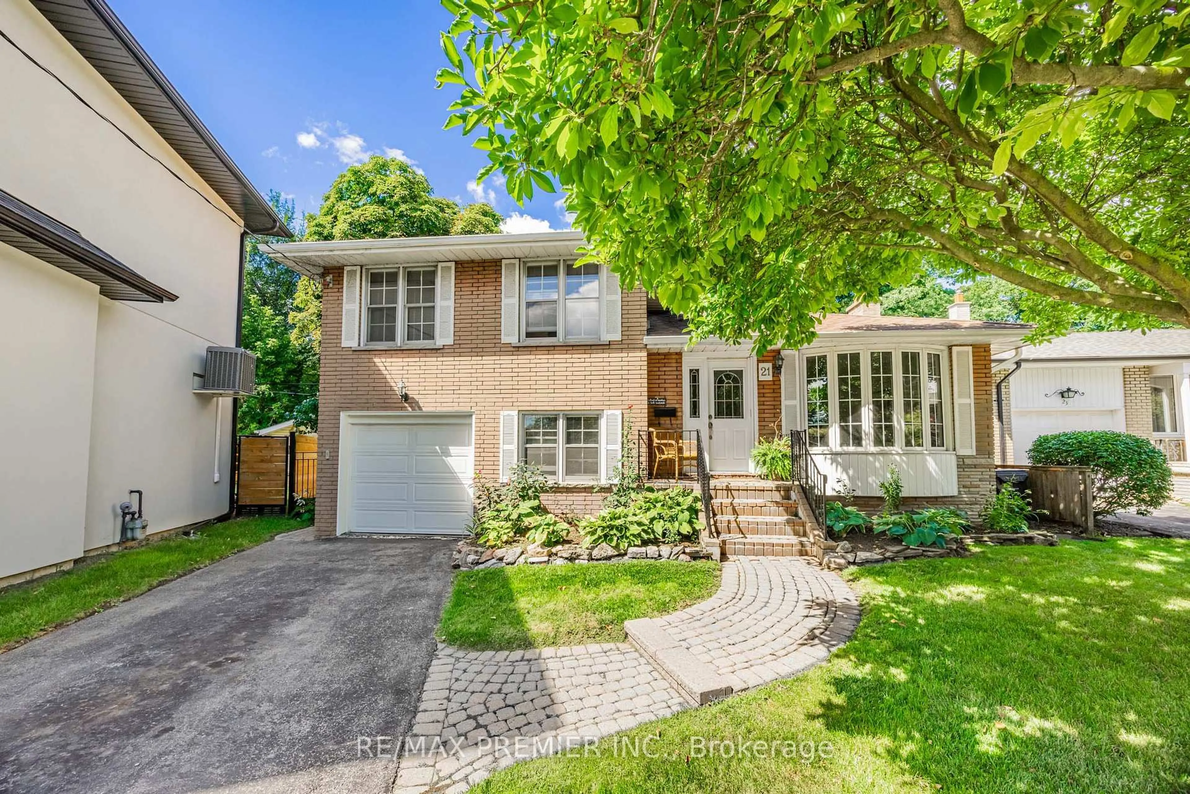 Home with brick exterior material, street for 21 Halbadier Pl, Toronto Ontario M9B 2H4