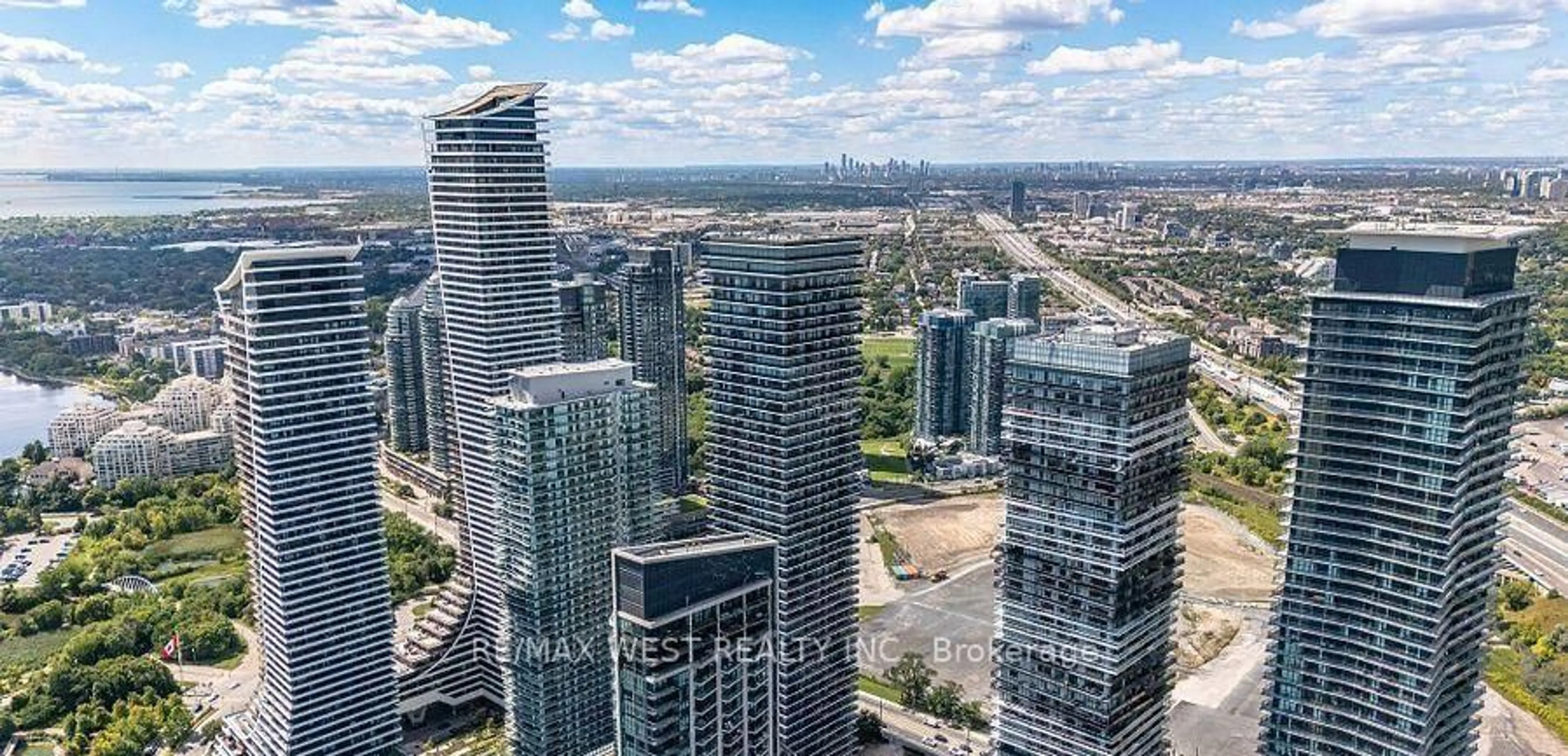 A pic from outside/outdoor area/front of a property/back of a property/a pic from drone, city buildings view from balcony for 70 Annie Craig Dr #4007, Toronto Ontario M8V 0G2