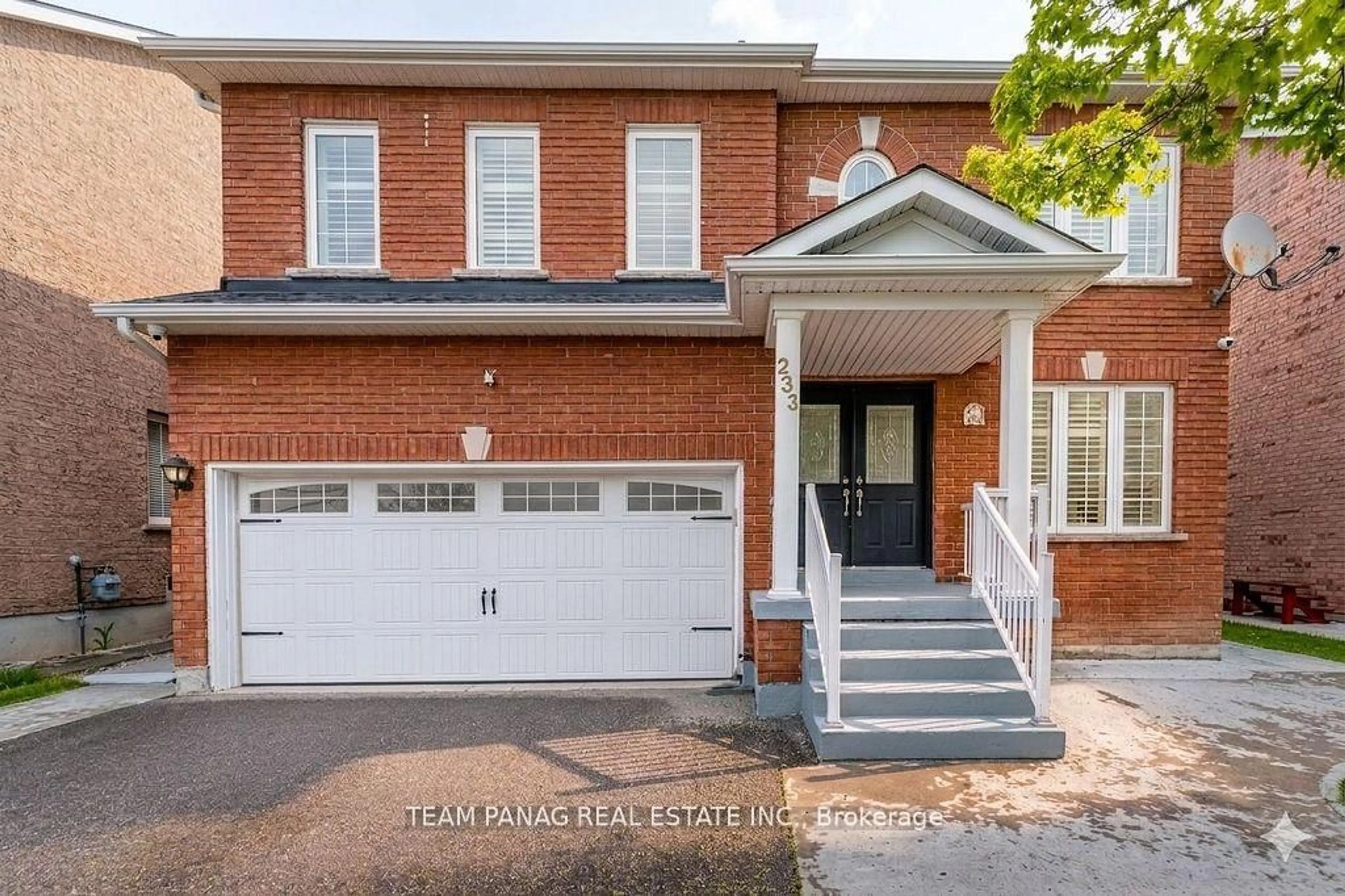 Home with brick exterior material, street for 233 Queen Mary Dr, Brampton Ontario L7A 3L3