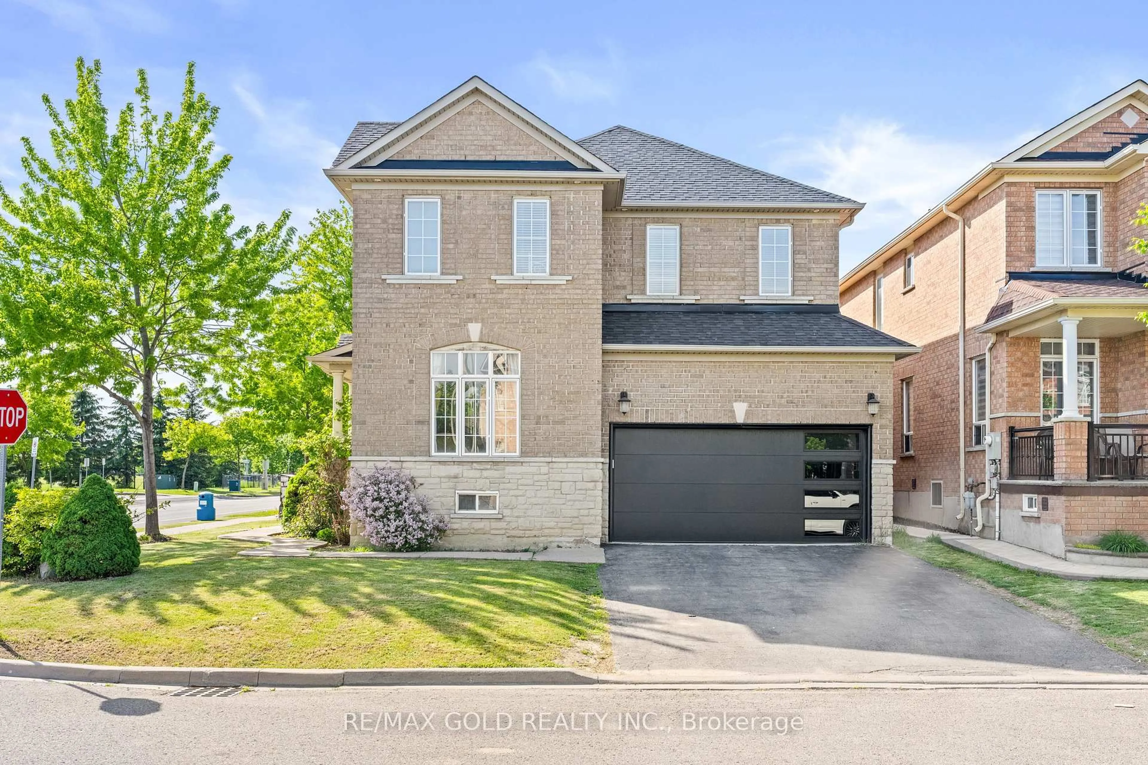 Home with brick exterior material, street for 261 Mountainash Rd, Brampton Ontario L6R 3M3