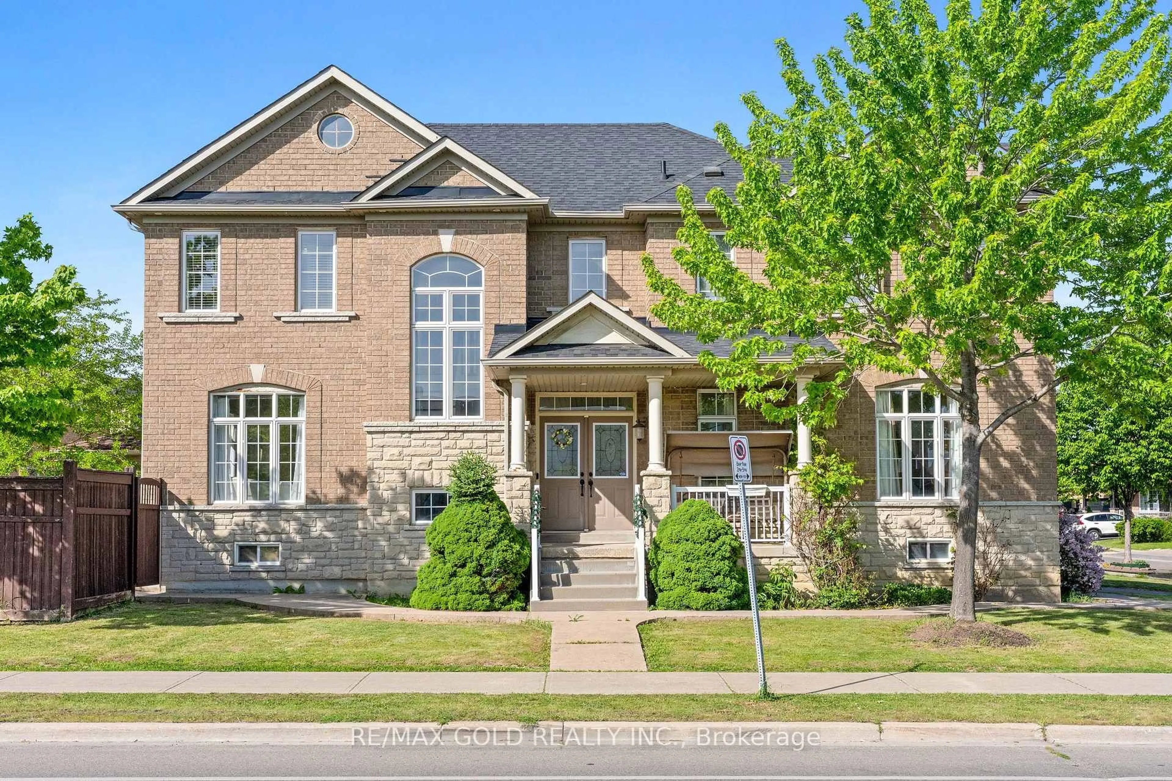 Home with brick exterior material, street for 261 Mountainash Rd, Brampton Ontario L6R 3M3