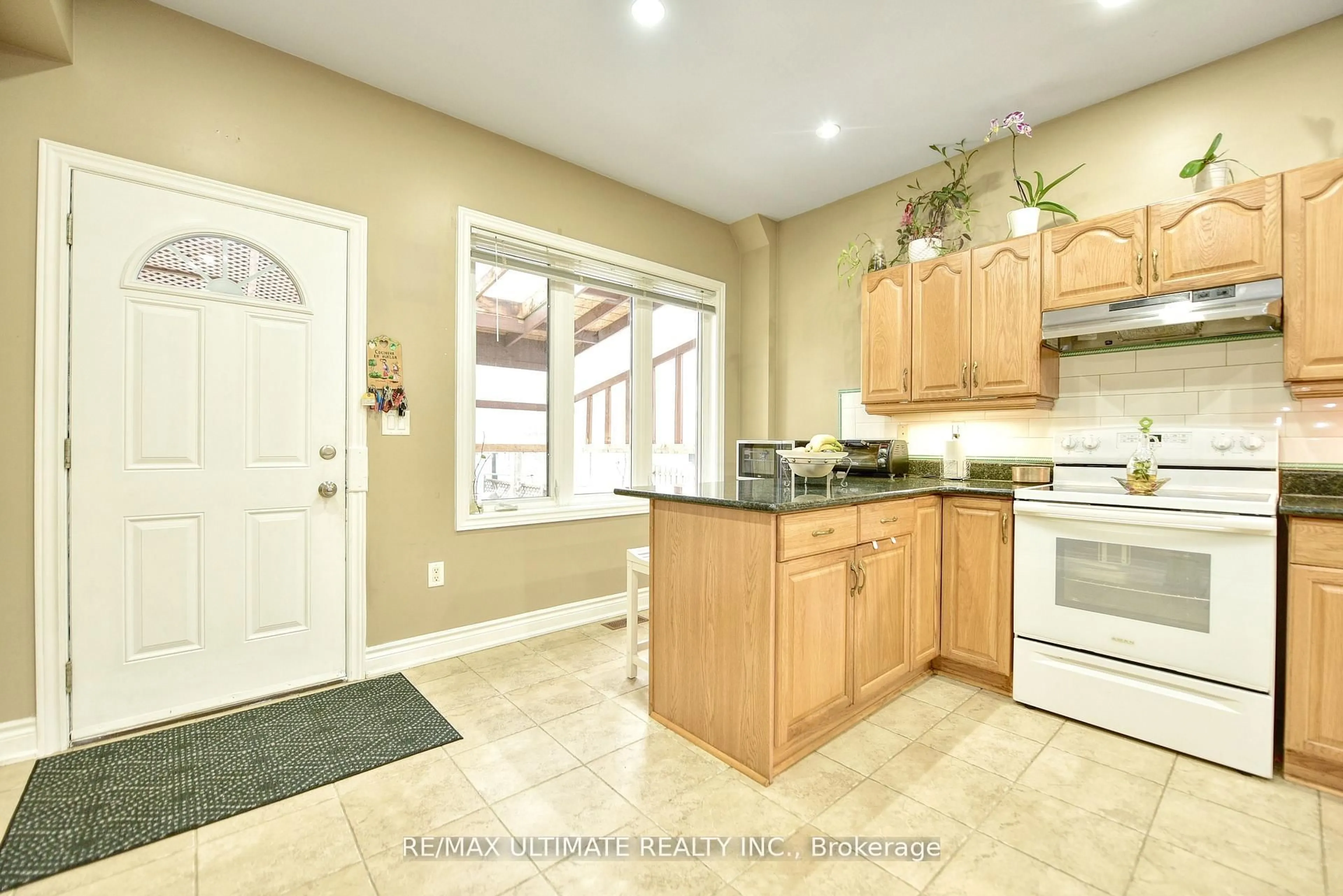 Open concept kitchen, ceramic/tile floor for 227 Earlscourt Ave, Toronto Ontario M6E 4B4
