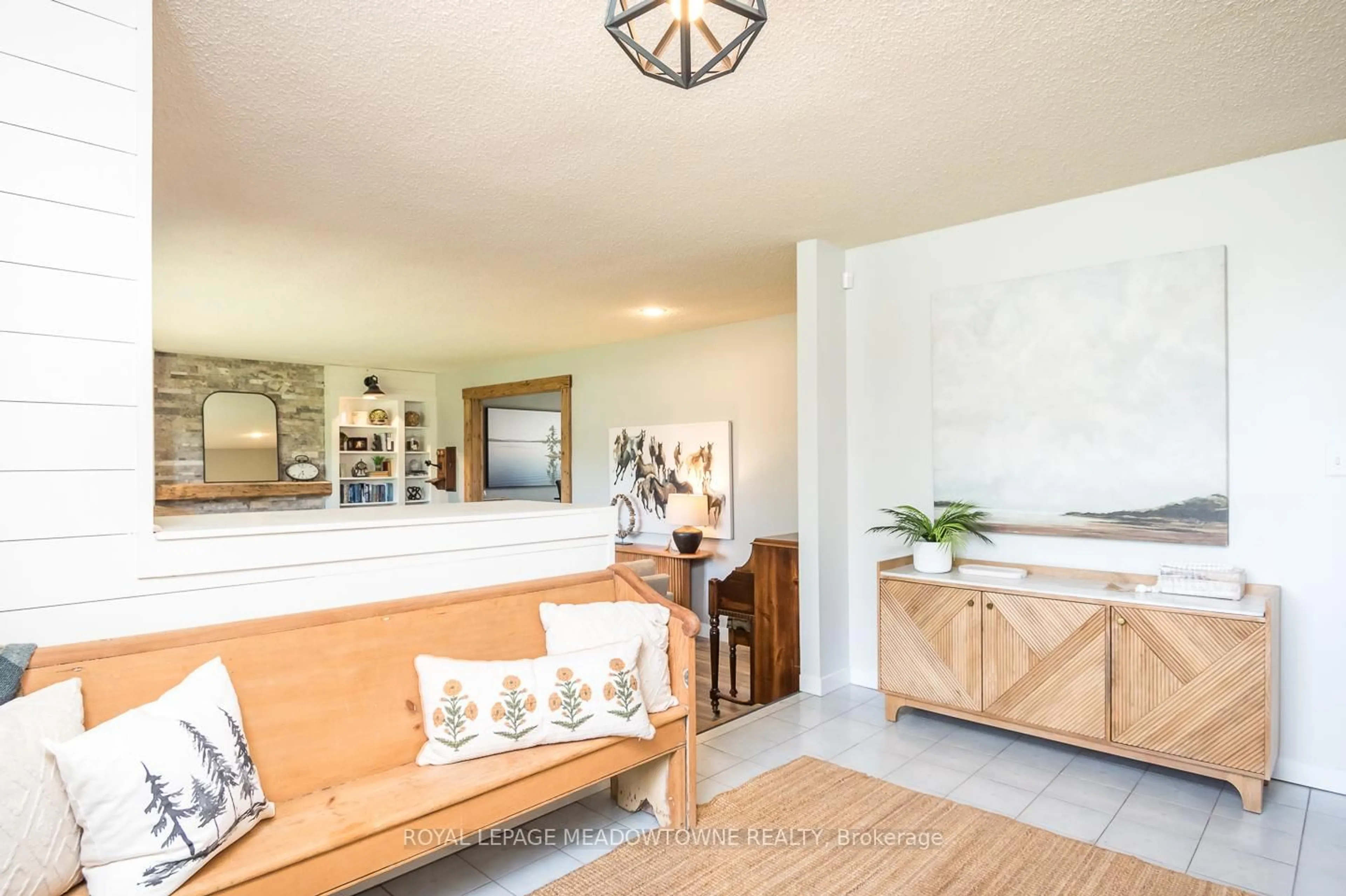 Living room with furniture, ceramic/tile floor for 11276 Amos Dr, Milton Ontario L0P 1B0