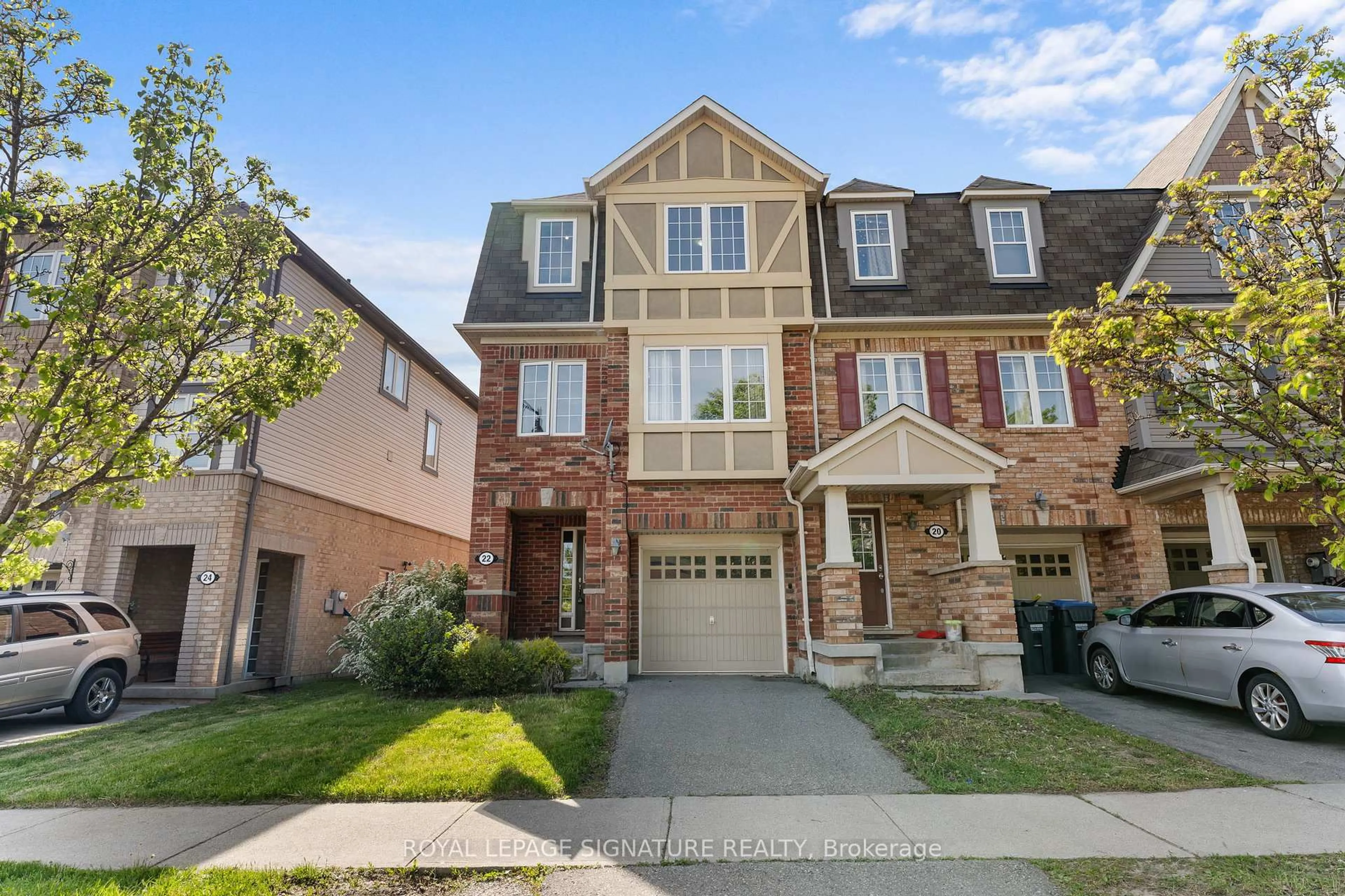 Home with brick exterior material, street for 22 Donomore Dr, Brampton Ontario L7A 0S7